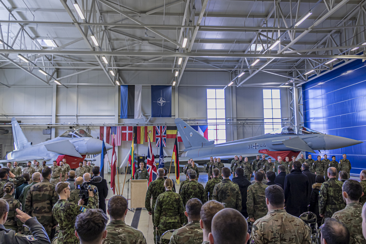 Image shows personnel in a hangar with Typhoons.