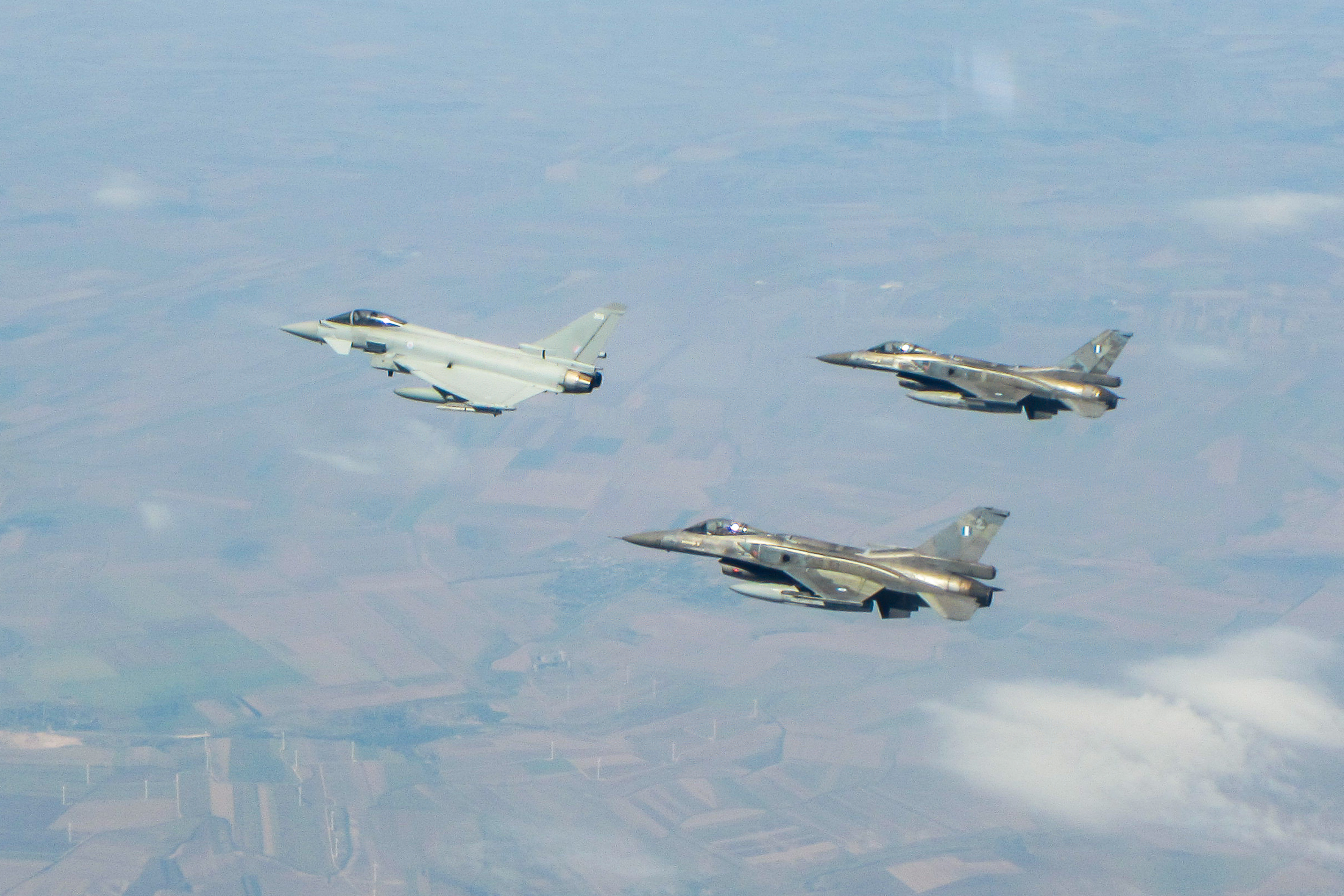 Image shows three Typhoon aircraft in flight.