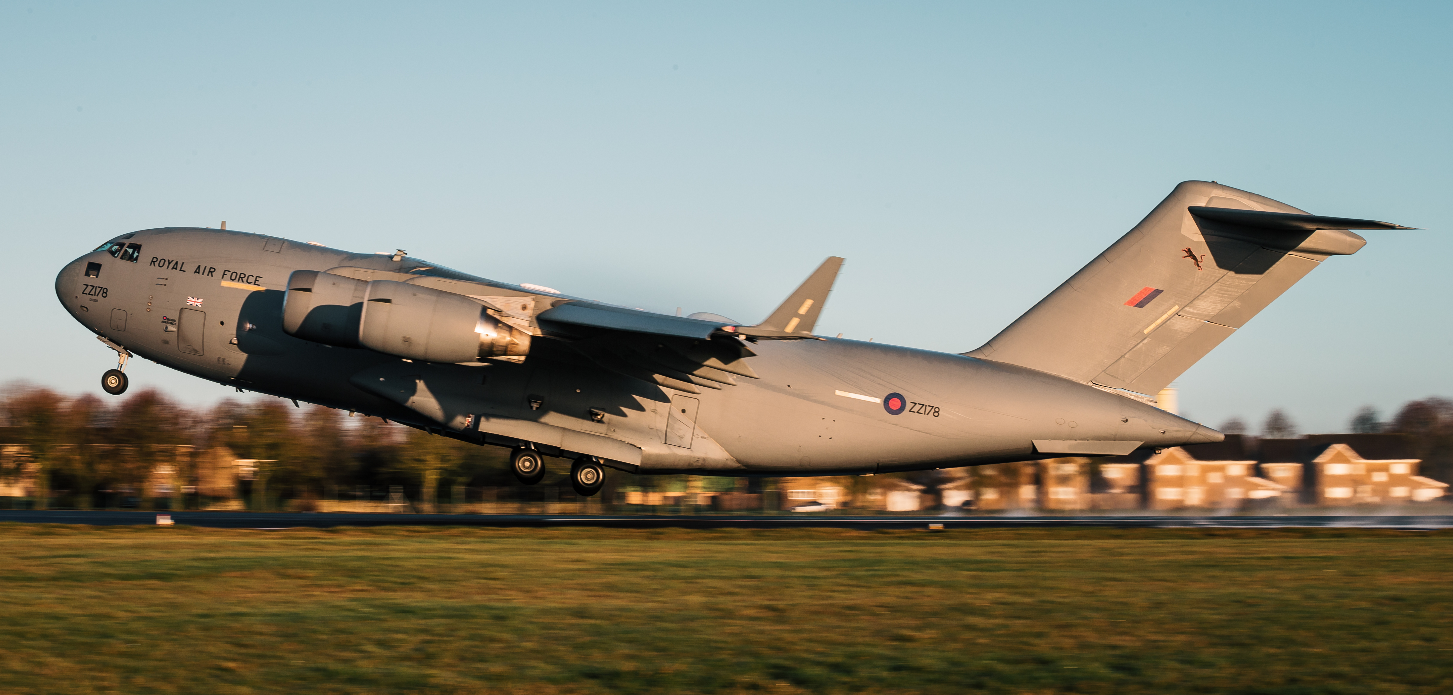 Image shows an RAF C-17 taking off.