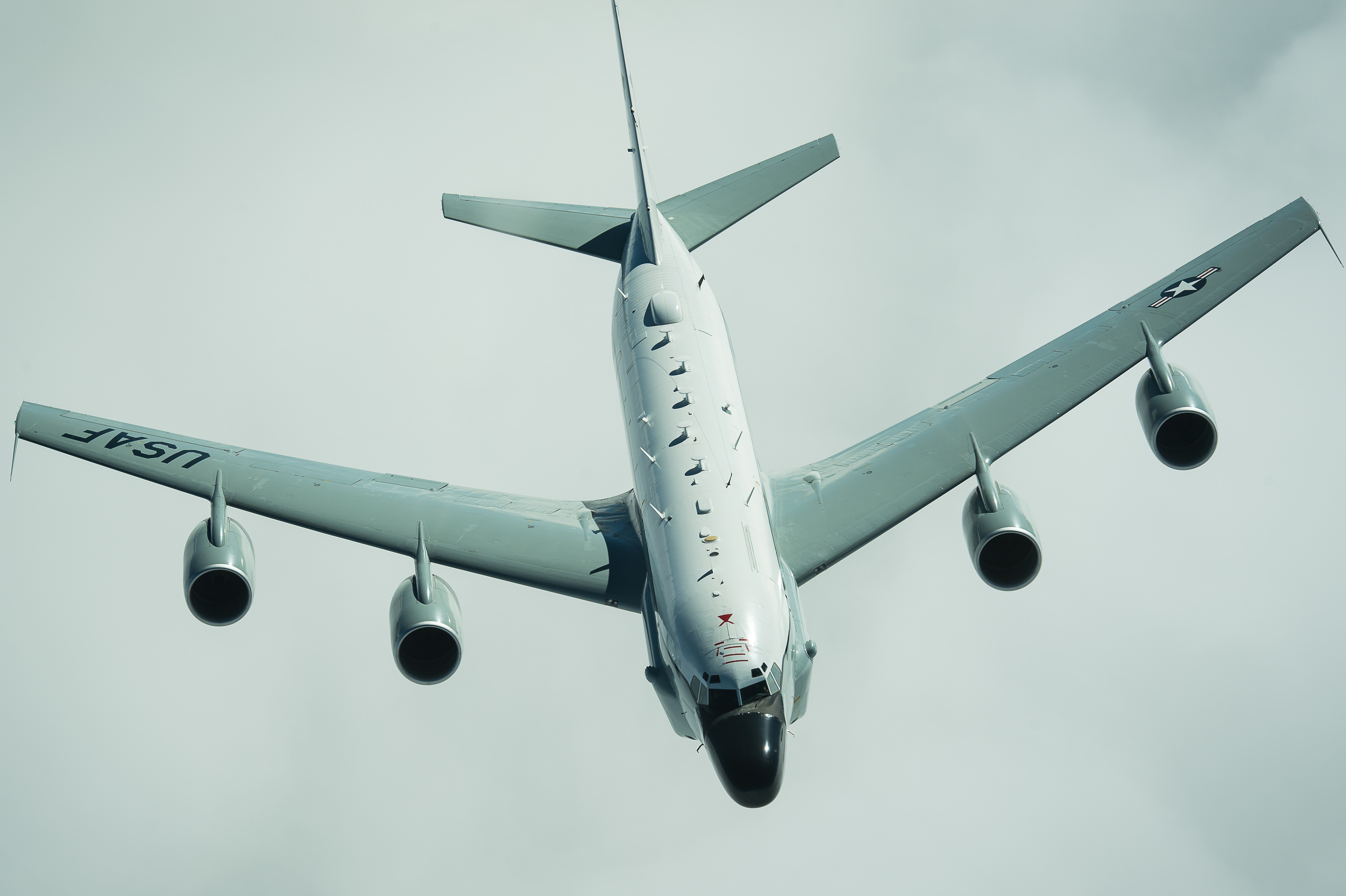 Image shows a Rivet Joint aircraft flying.