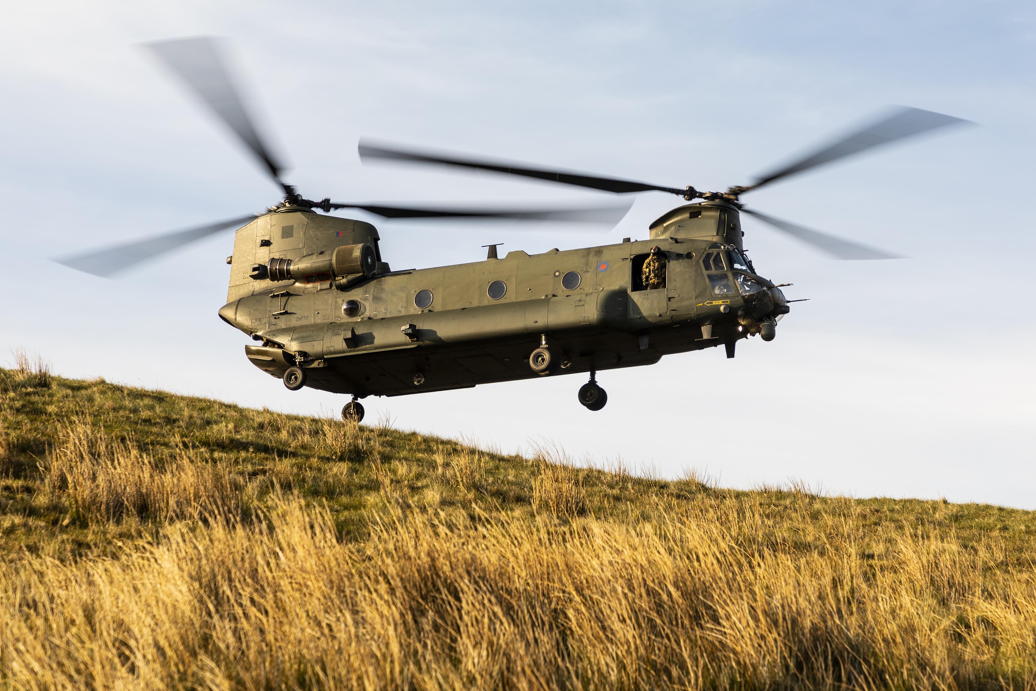 Image shows an RAF Chinook helicopter flying.