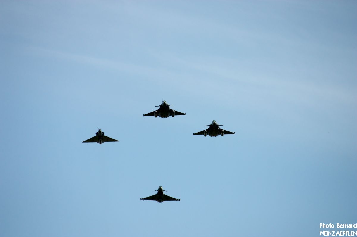 Flypast with four aircraft in formation.