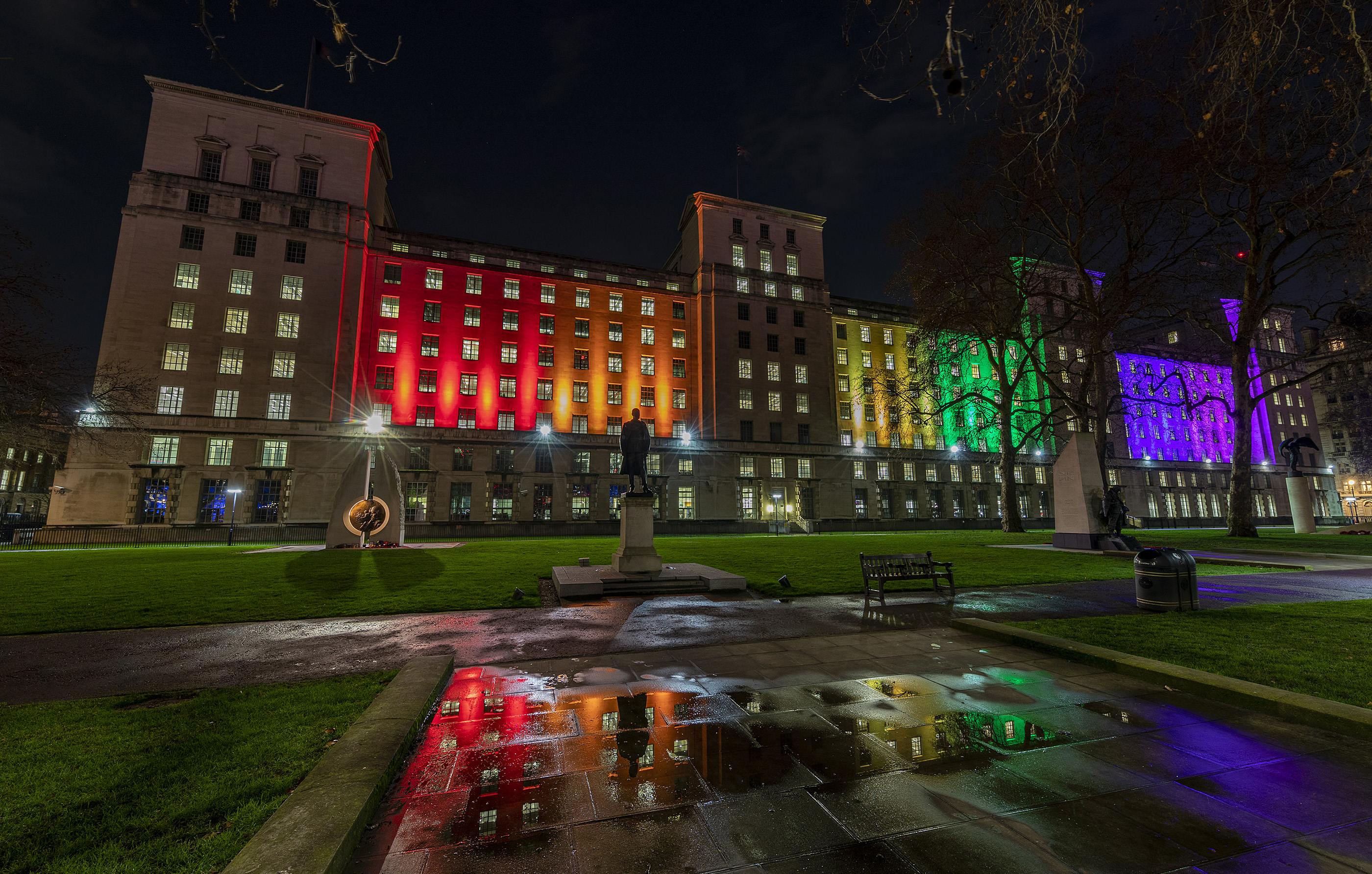 Main Building with rainbow colour projected on the outside. 