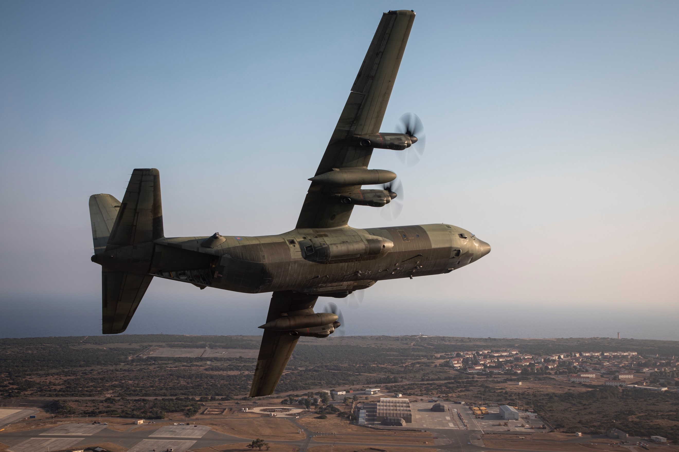 Image shows RAF Hercules in flight.