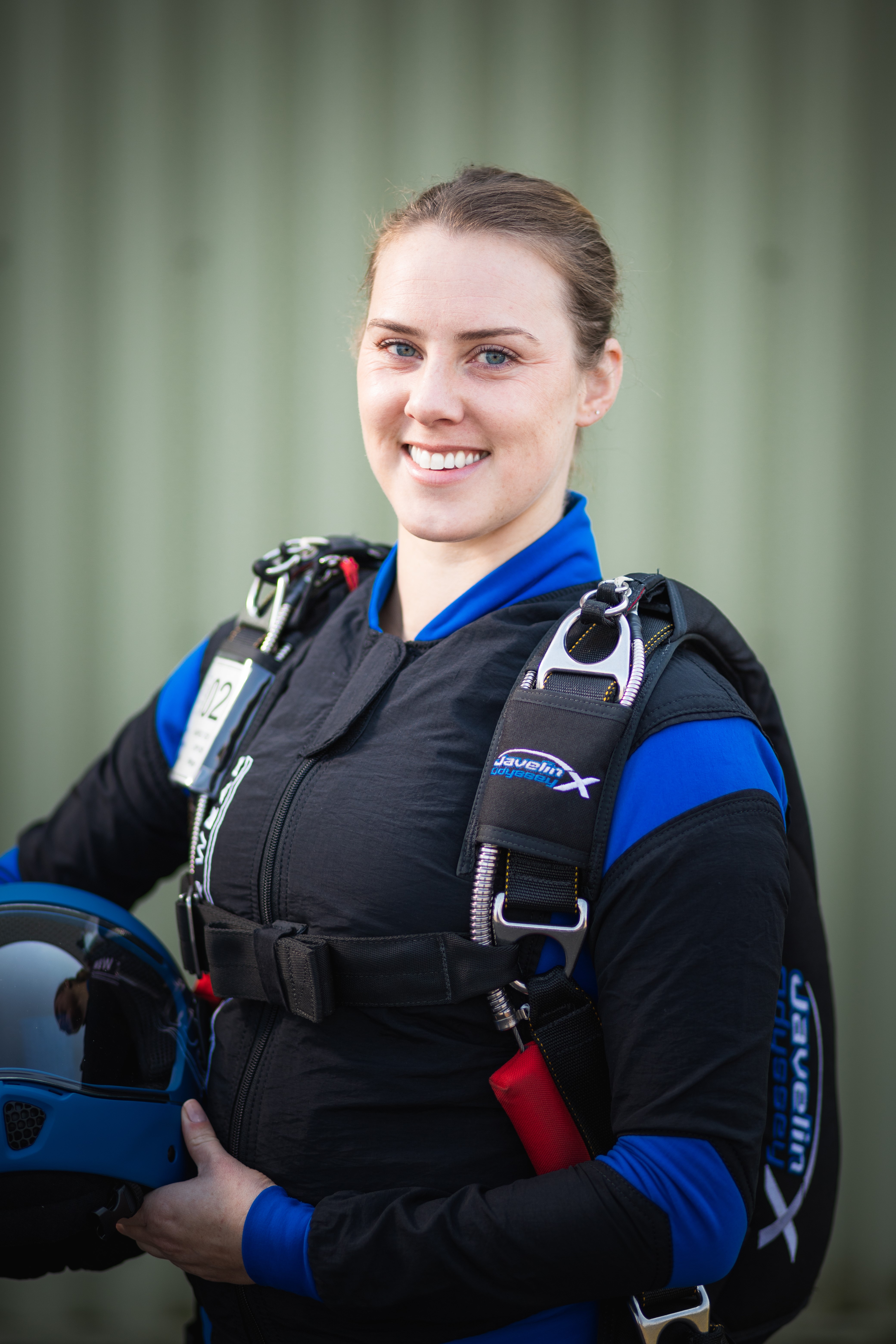 Sergeant Rachel Fisk smiles in parachuting gear.