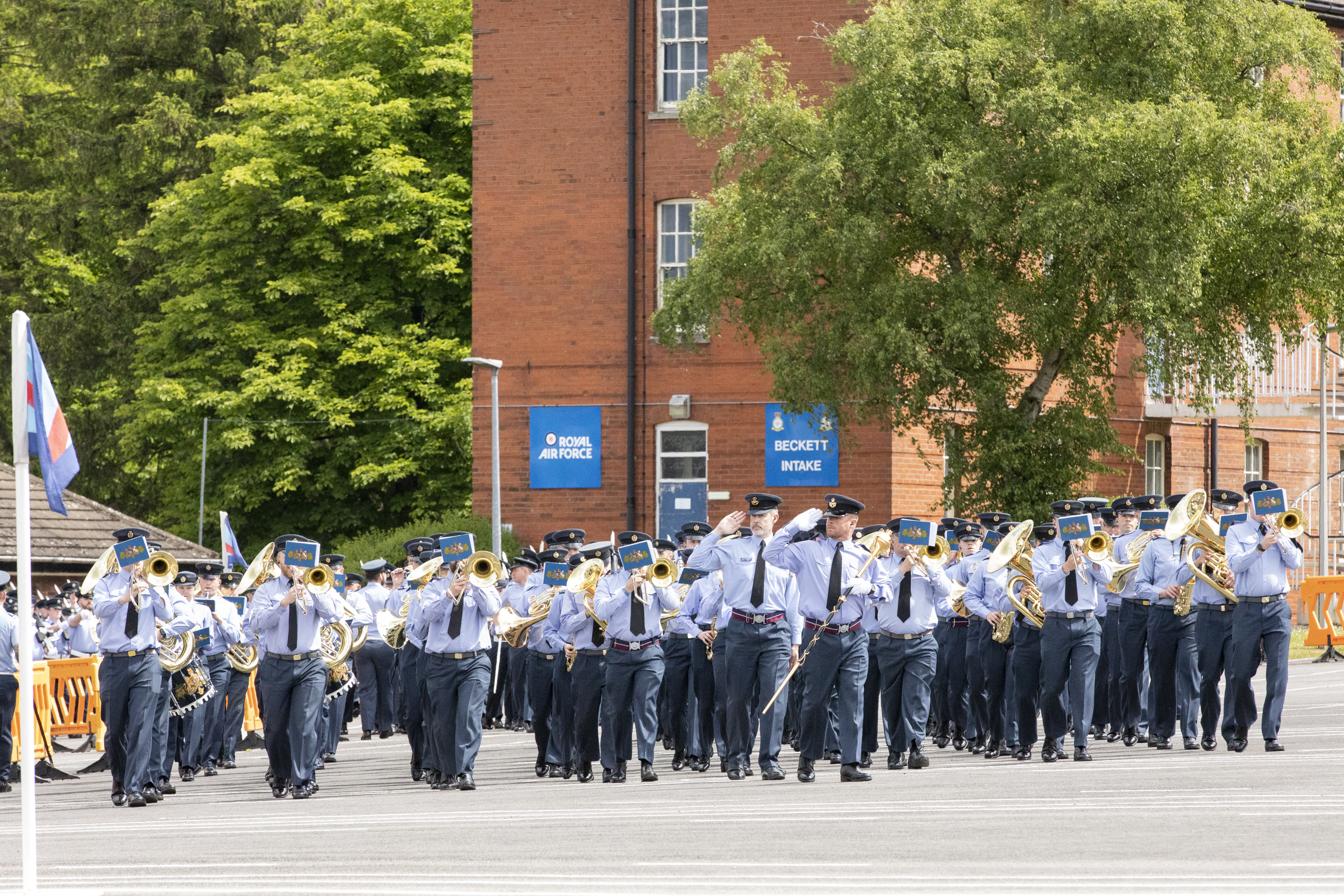 RAF Musicians practise on parade, with instruments.