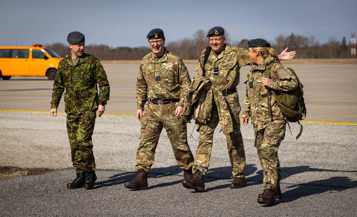 Image shows RAF personnel working across the airfield.