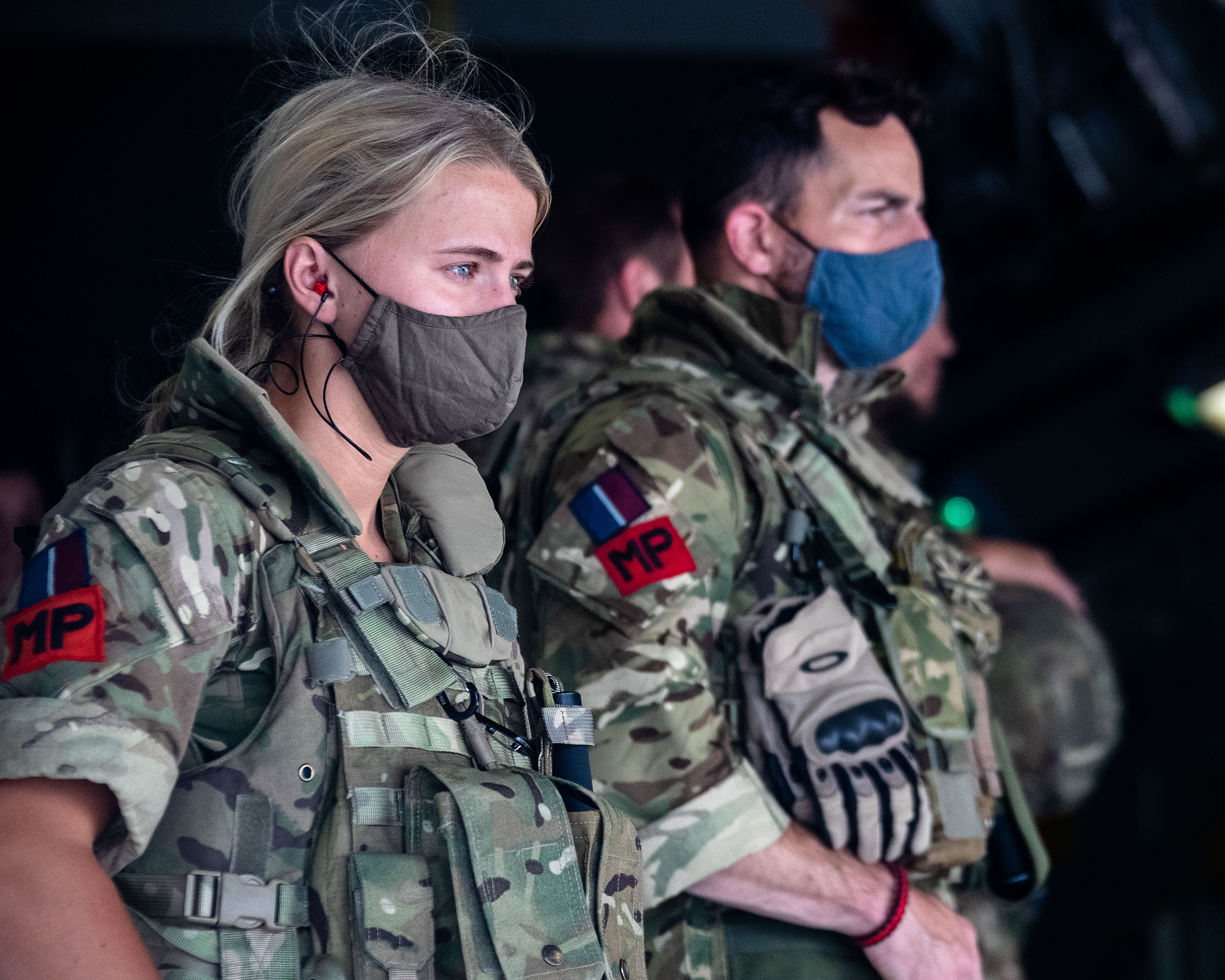 RAF Police standing.