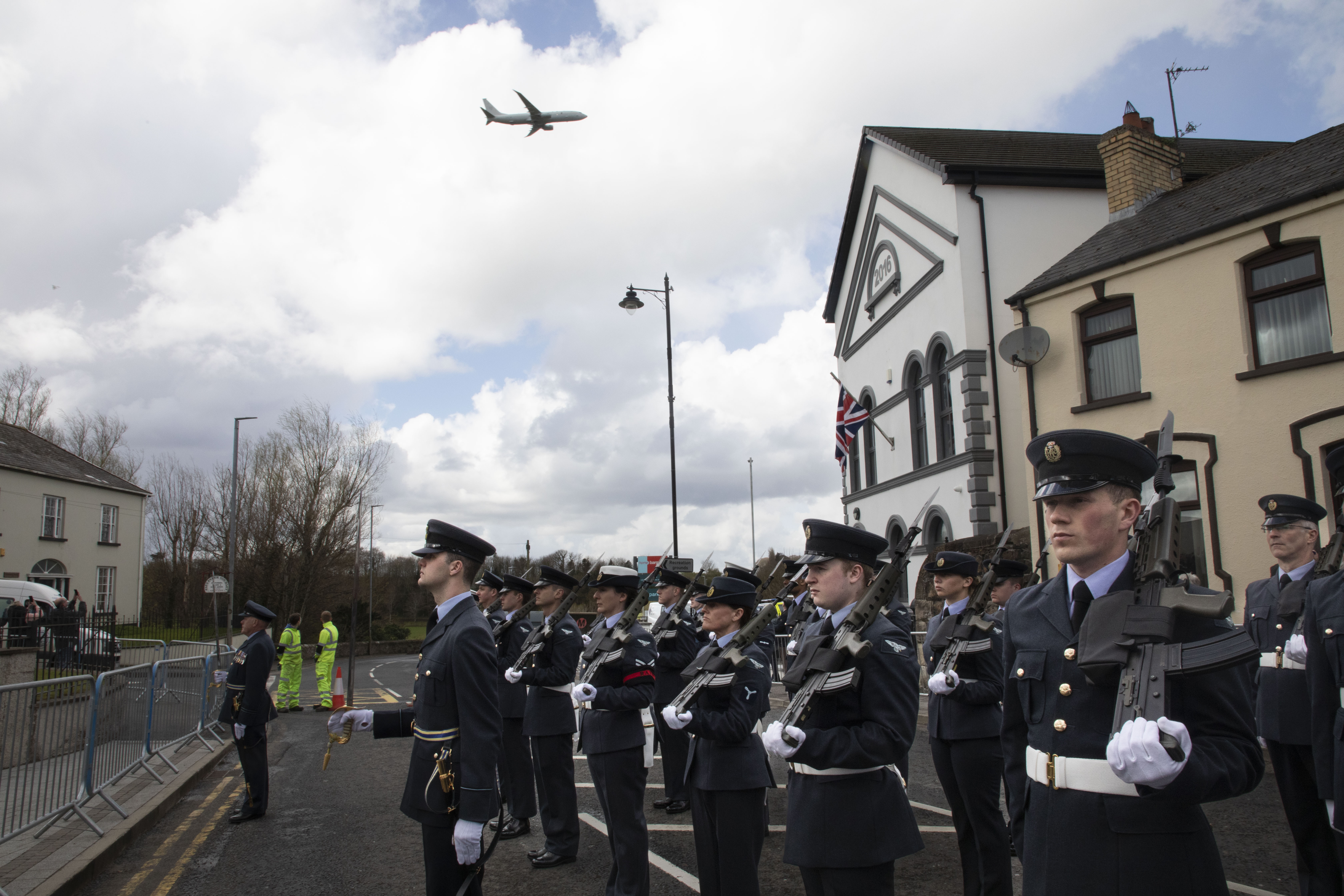 Personnel parade through the streets with Poseidon flypast.
