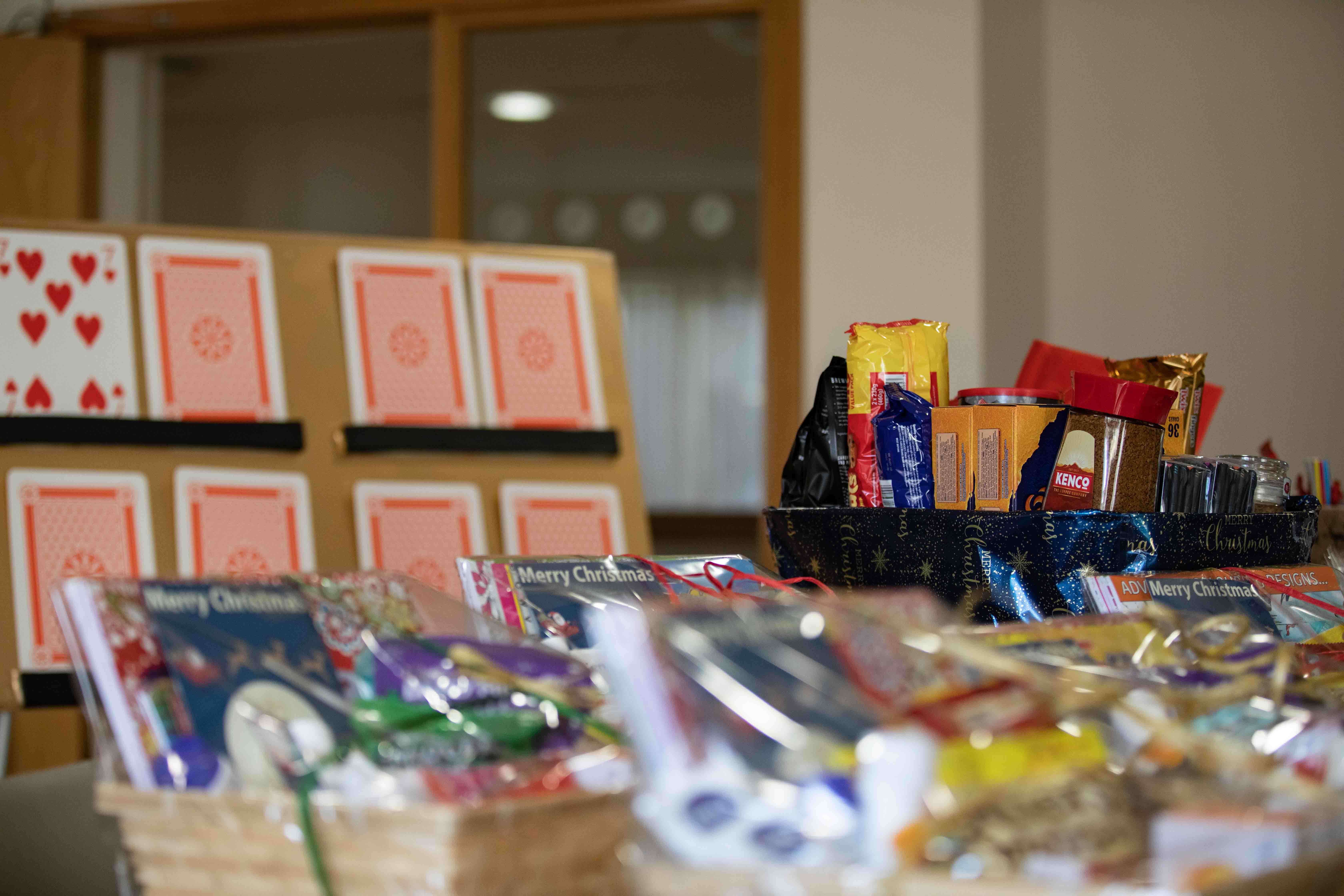 The hampers with the ‘Play Your Cards Right’ board in the background