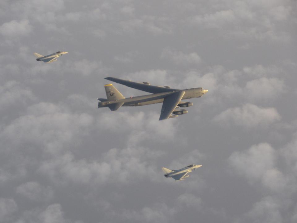 Two RAF Typhoons and a United States Air Force B-52 Stratofortress bomber.