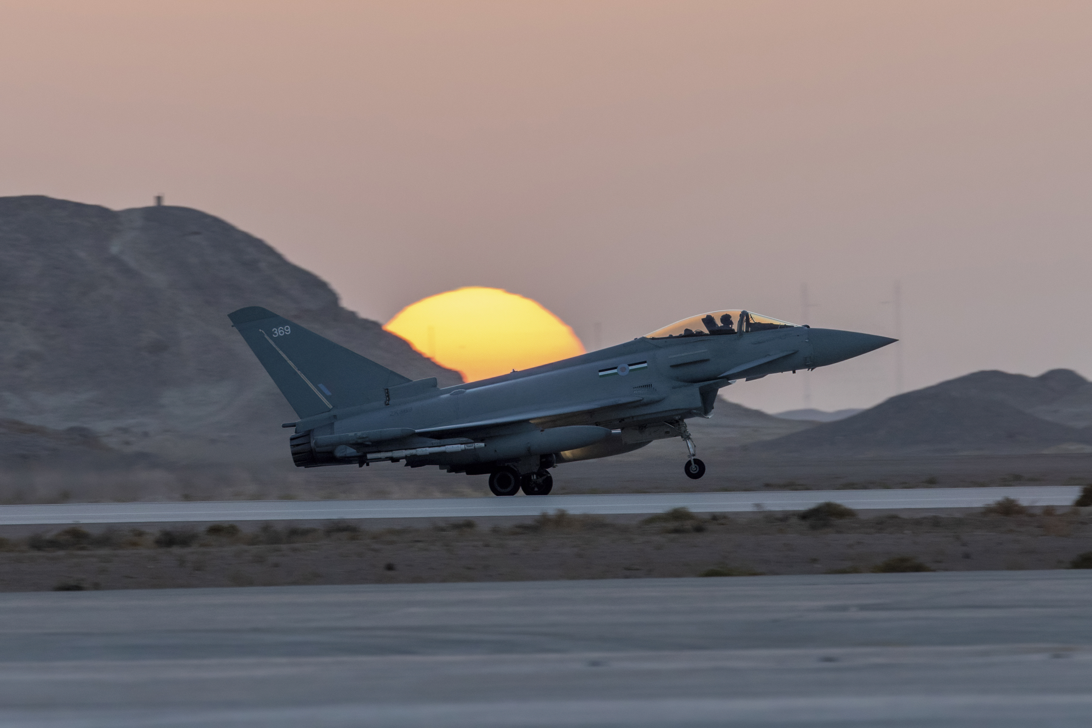 Typhoon taking off in the sunset.