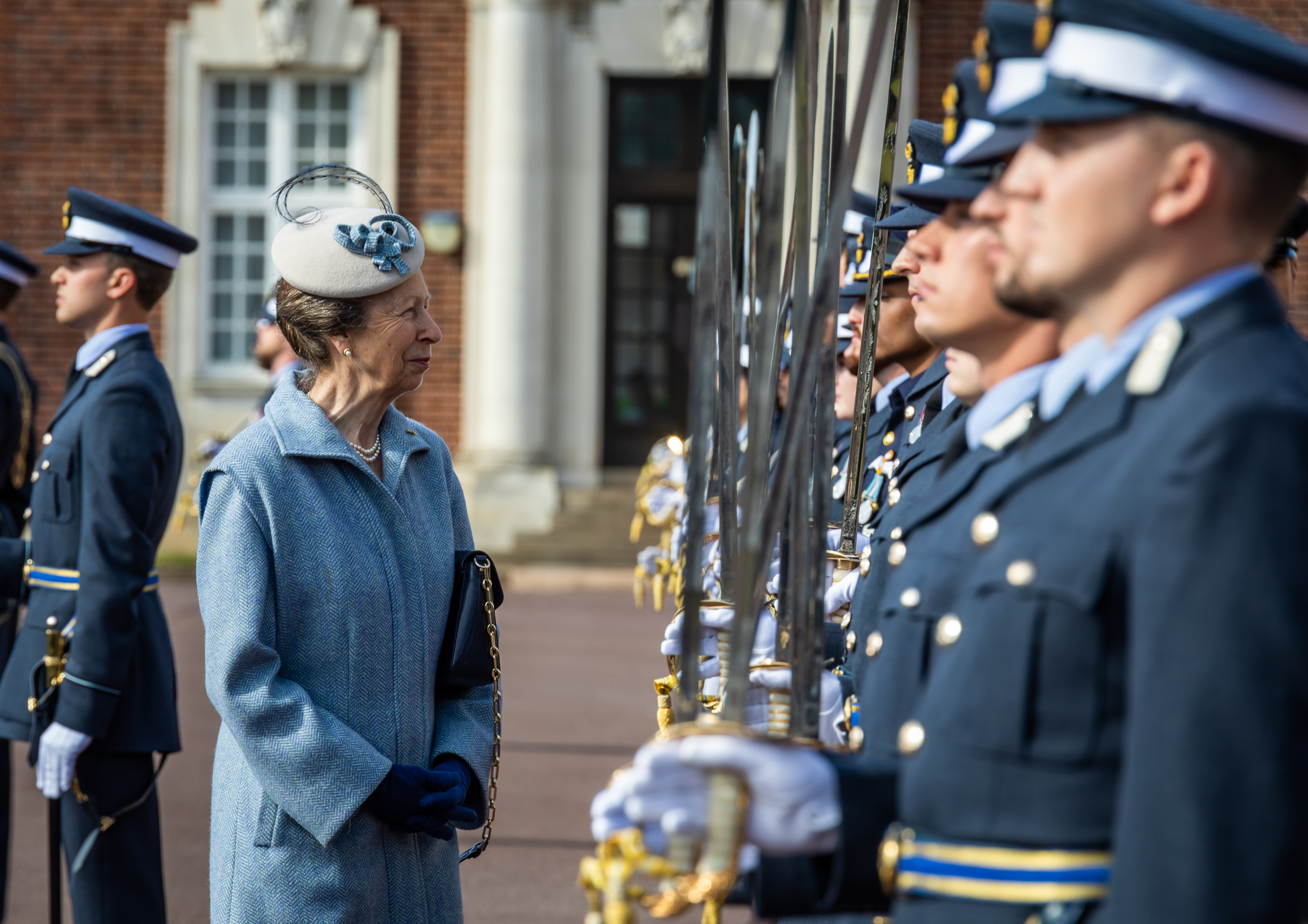 Her Royal Highness talks to personnel.