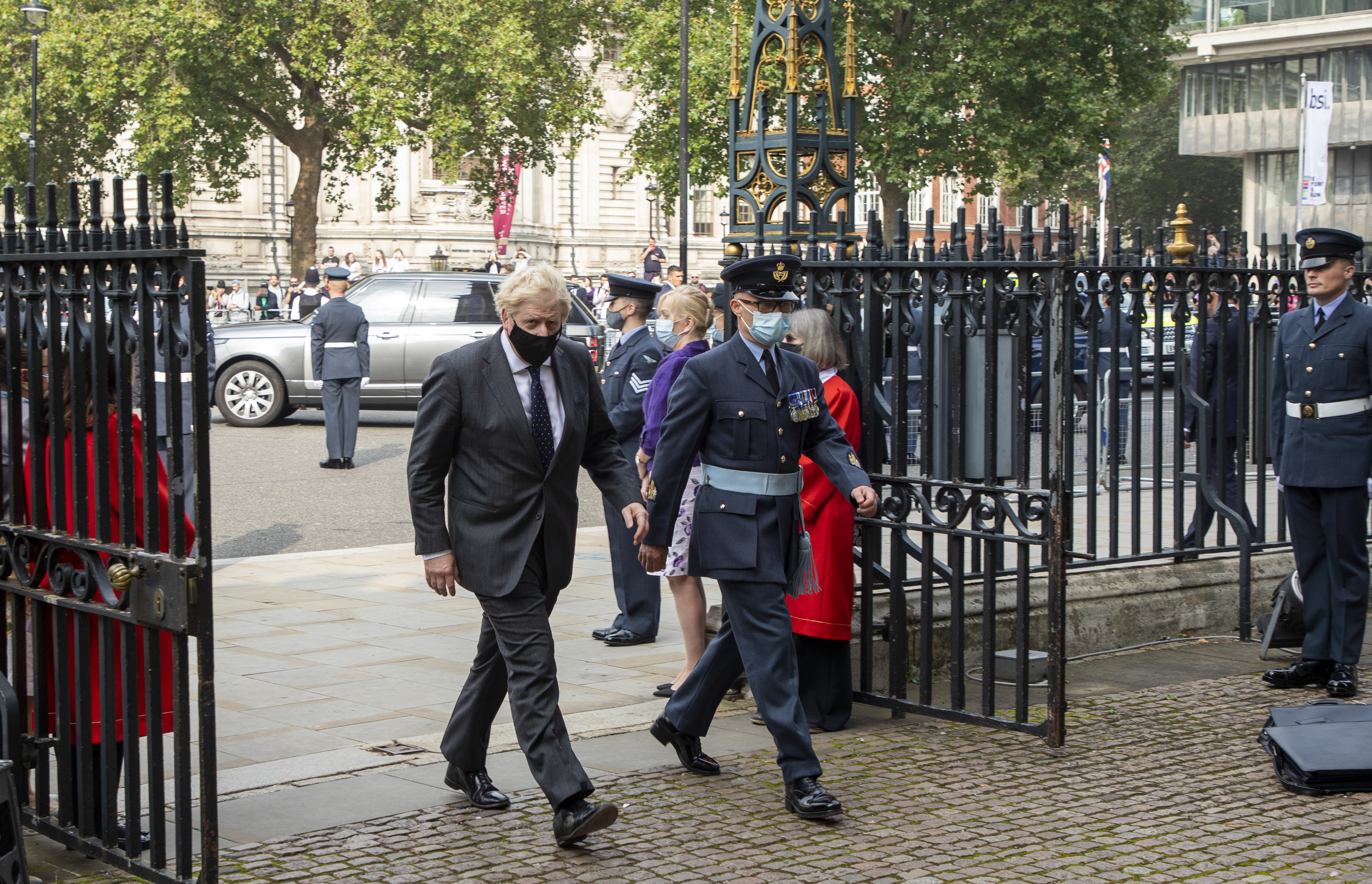 Prime Minister walks into Westminster Abbey.