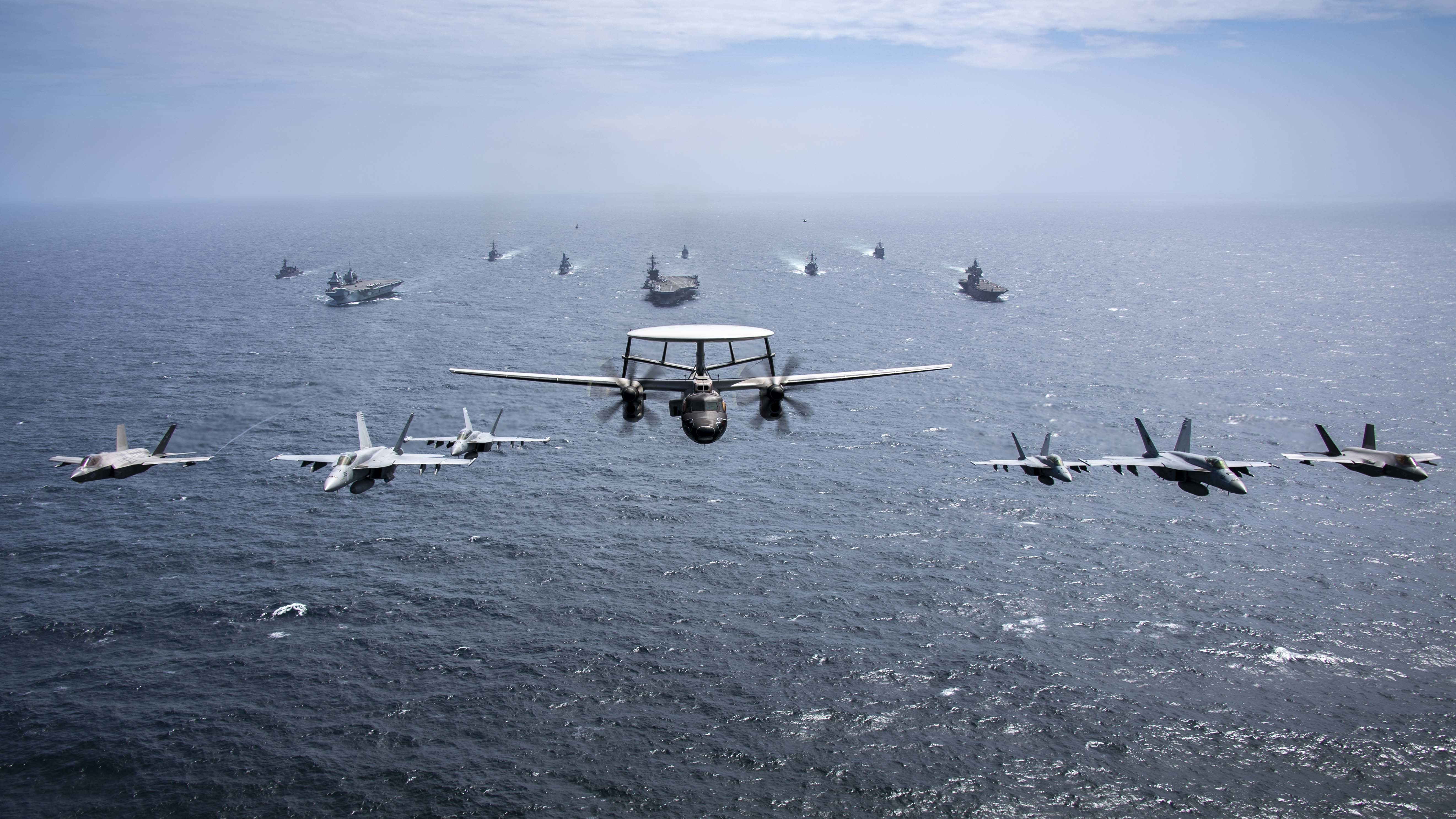 Formation of aircraft and carrier. 