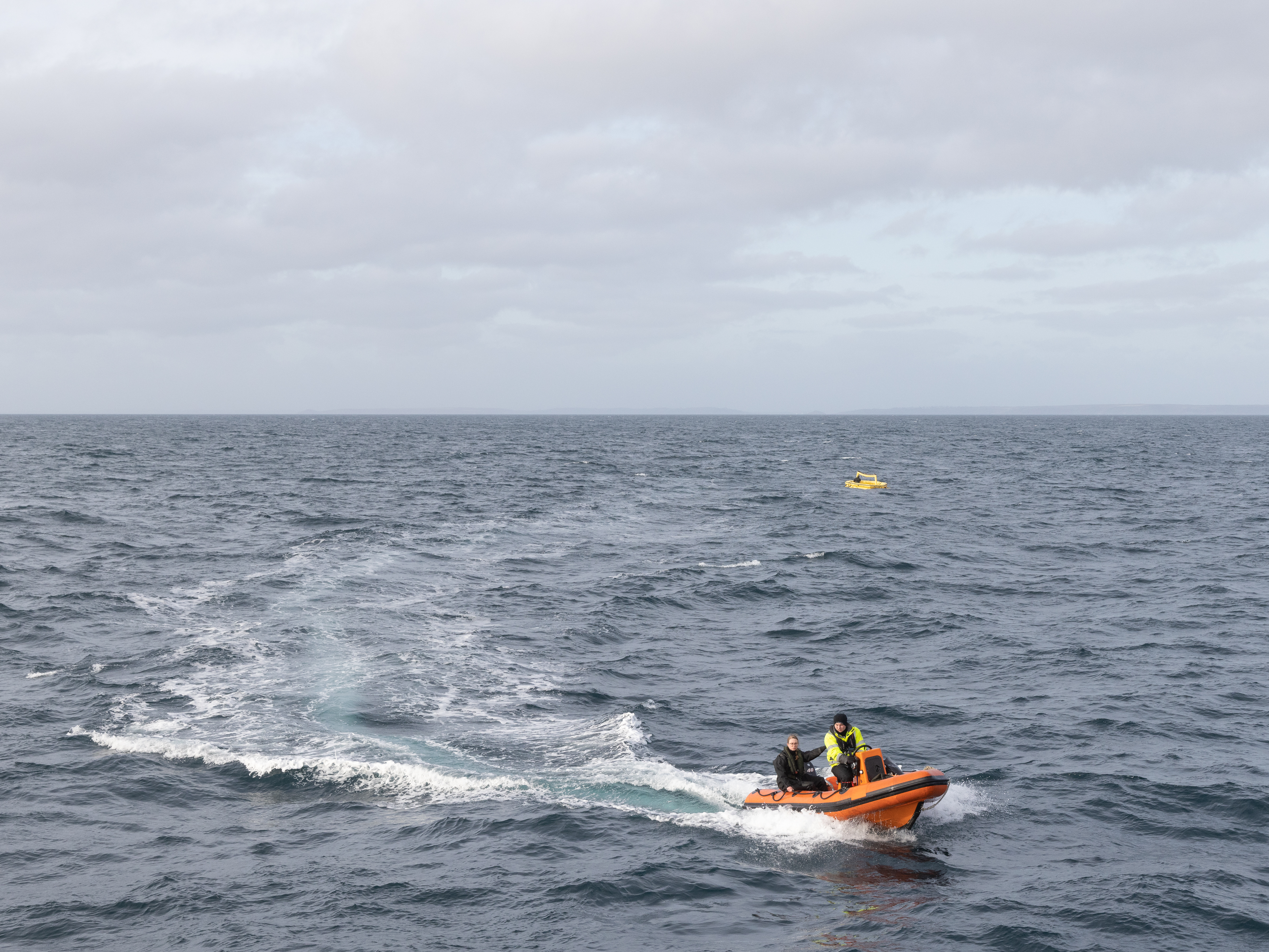 Image shows RAF Search and Rescue lifeboat in the sea.