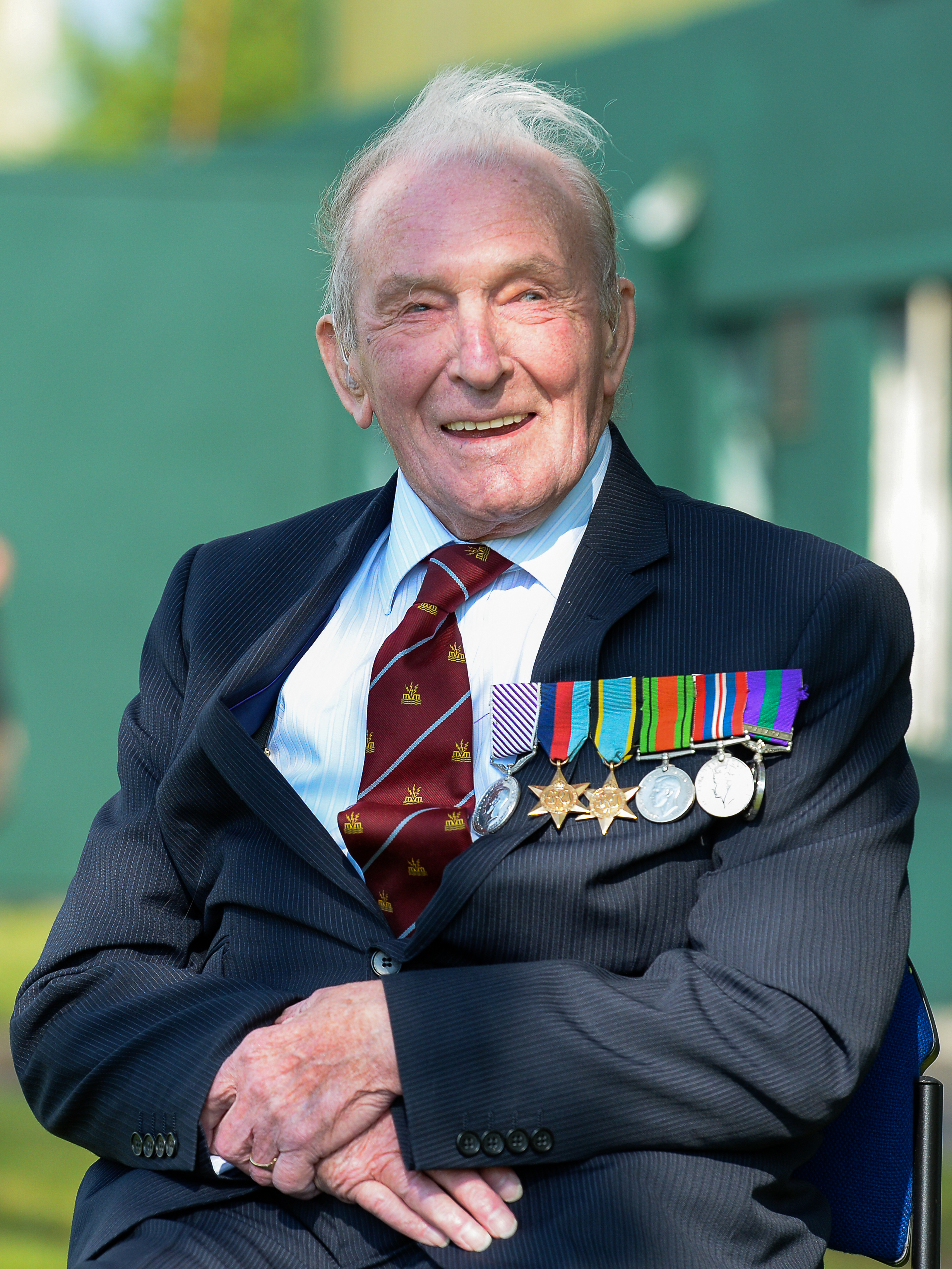 Veteran sits for picture.