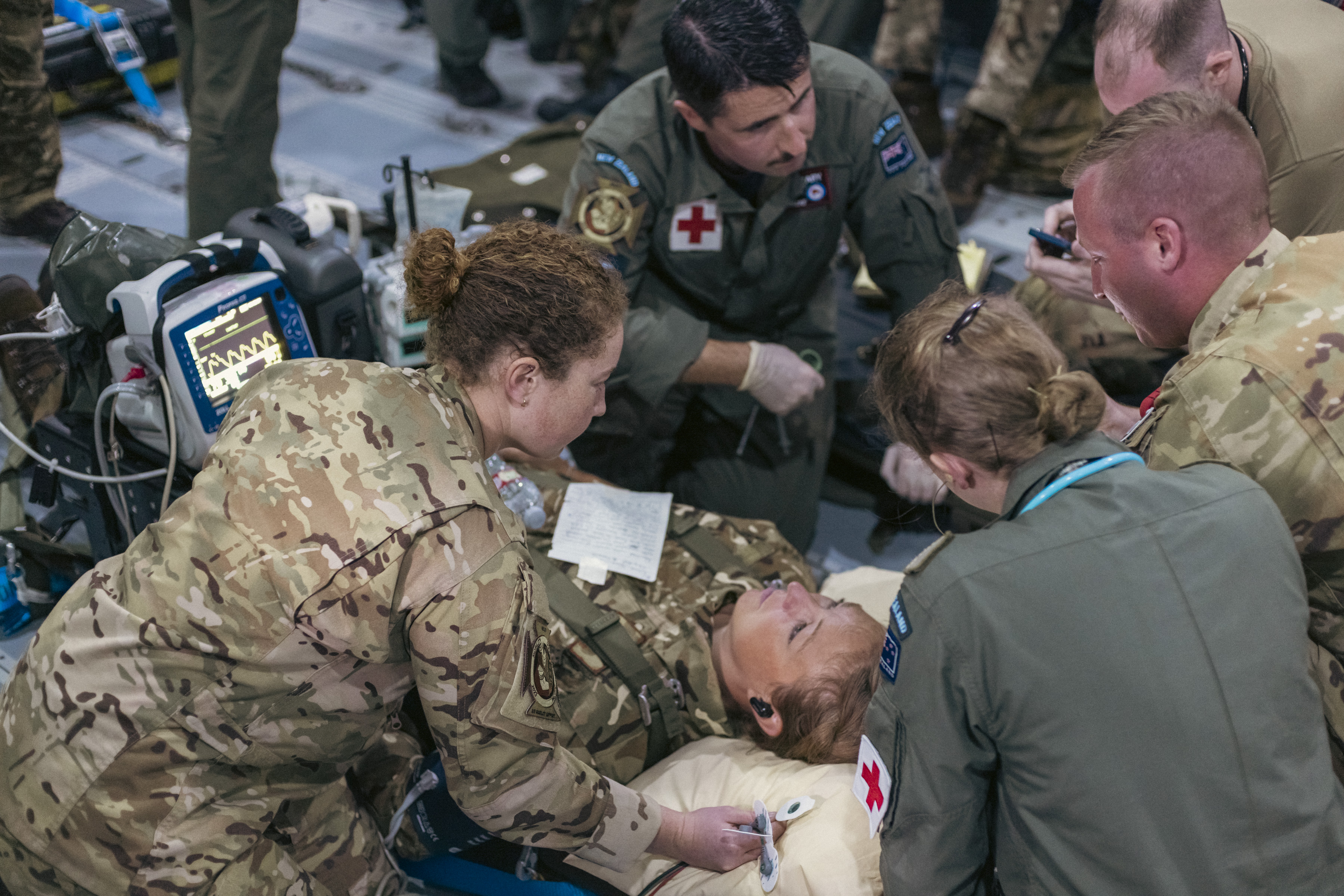 Colleagues from multiple nations working on a med exercise onboard an RAF aircraft