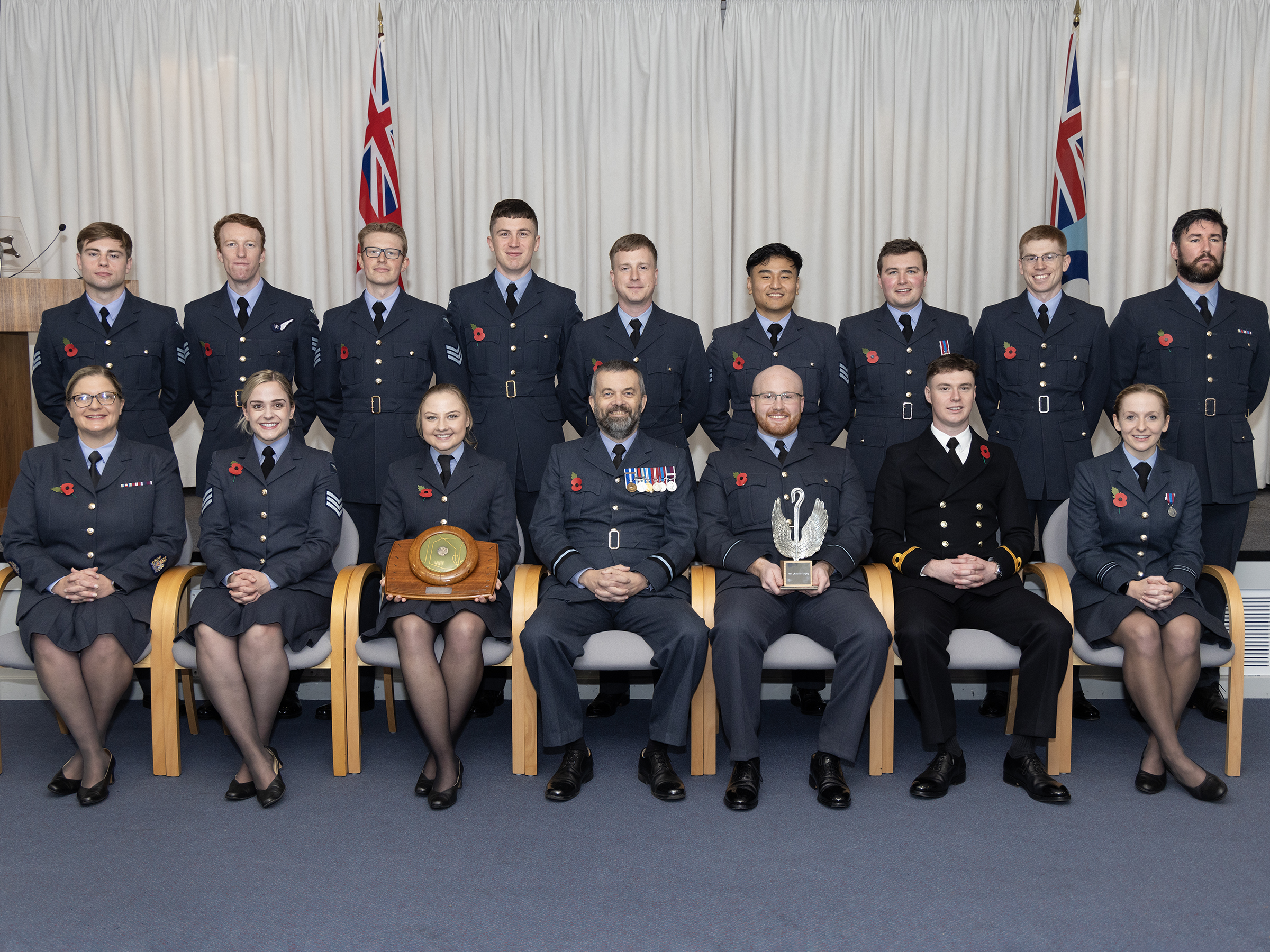 Graduating students sat for a course photo