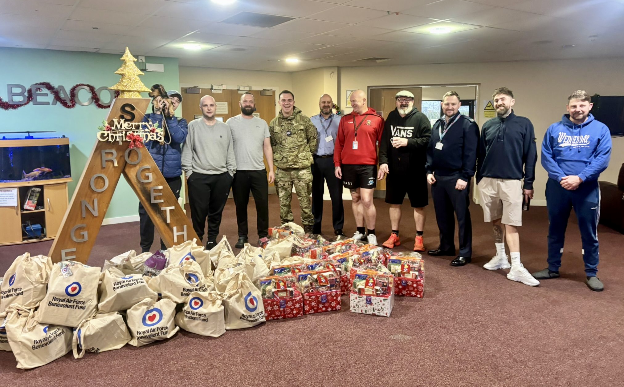 Veterans at The Beacon with gifts and hampers