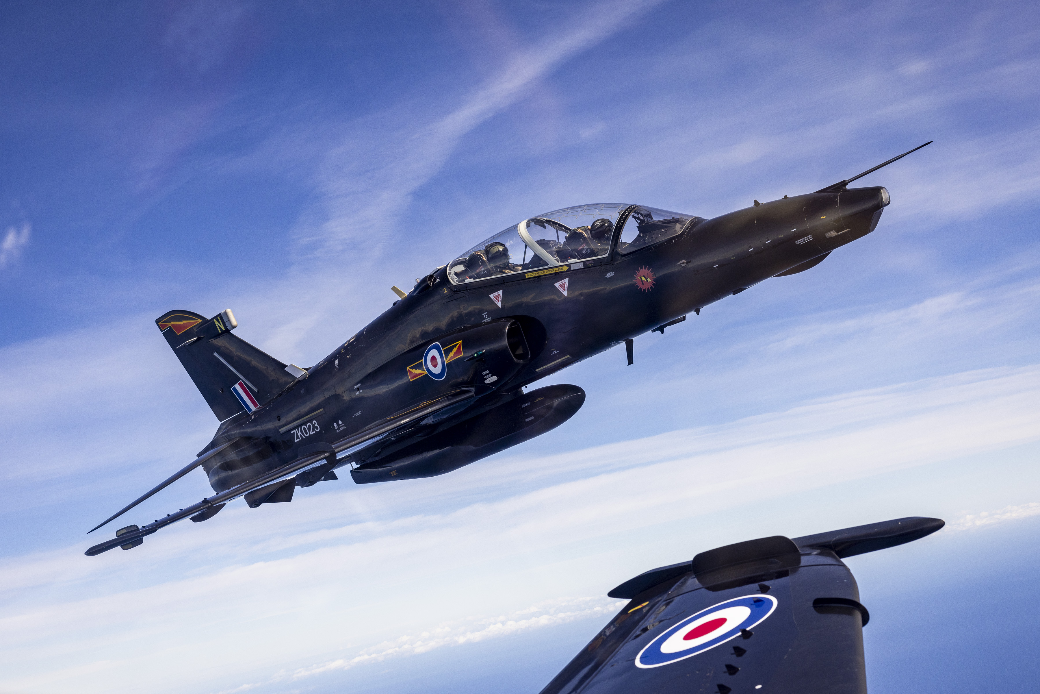 "Sky High". A Hawk T2 in flight against a backdrop of blue skies.