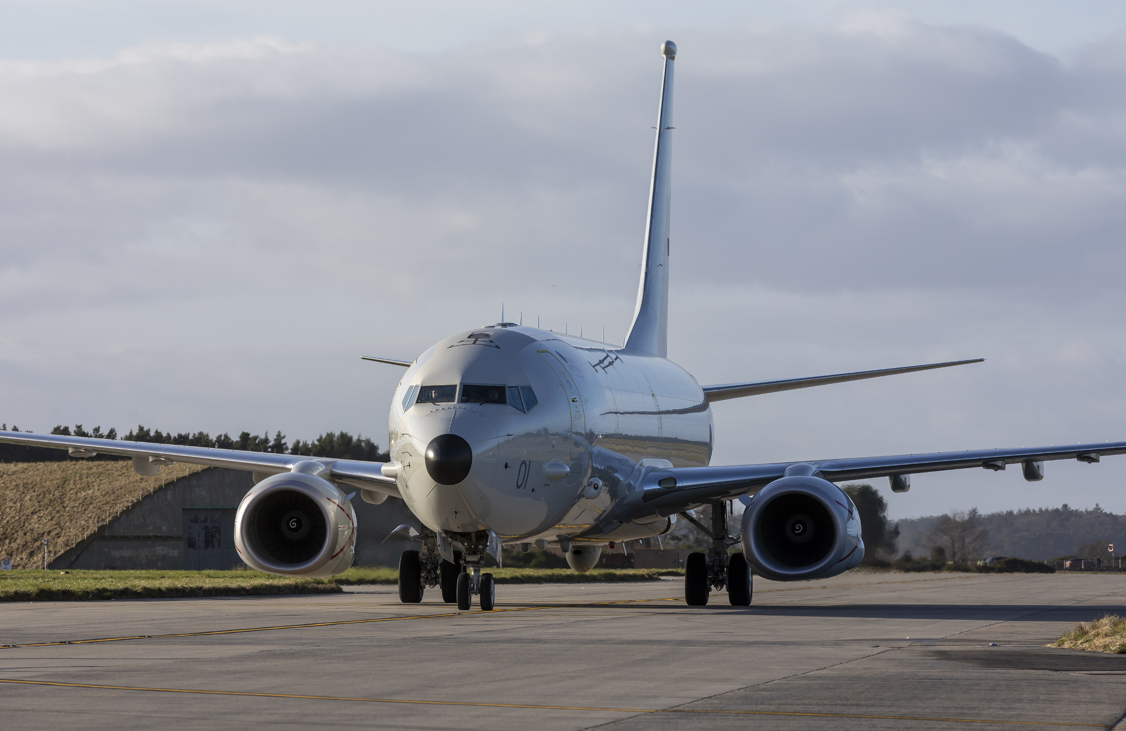 An RAF P-8A Poseidon on a runway.