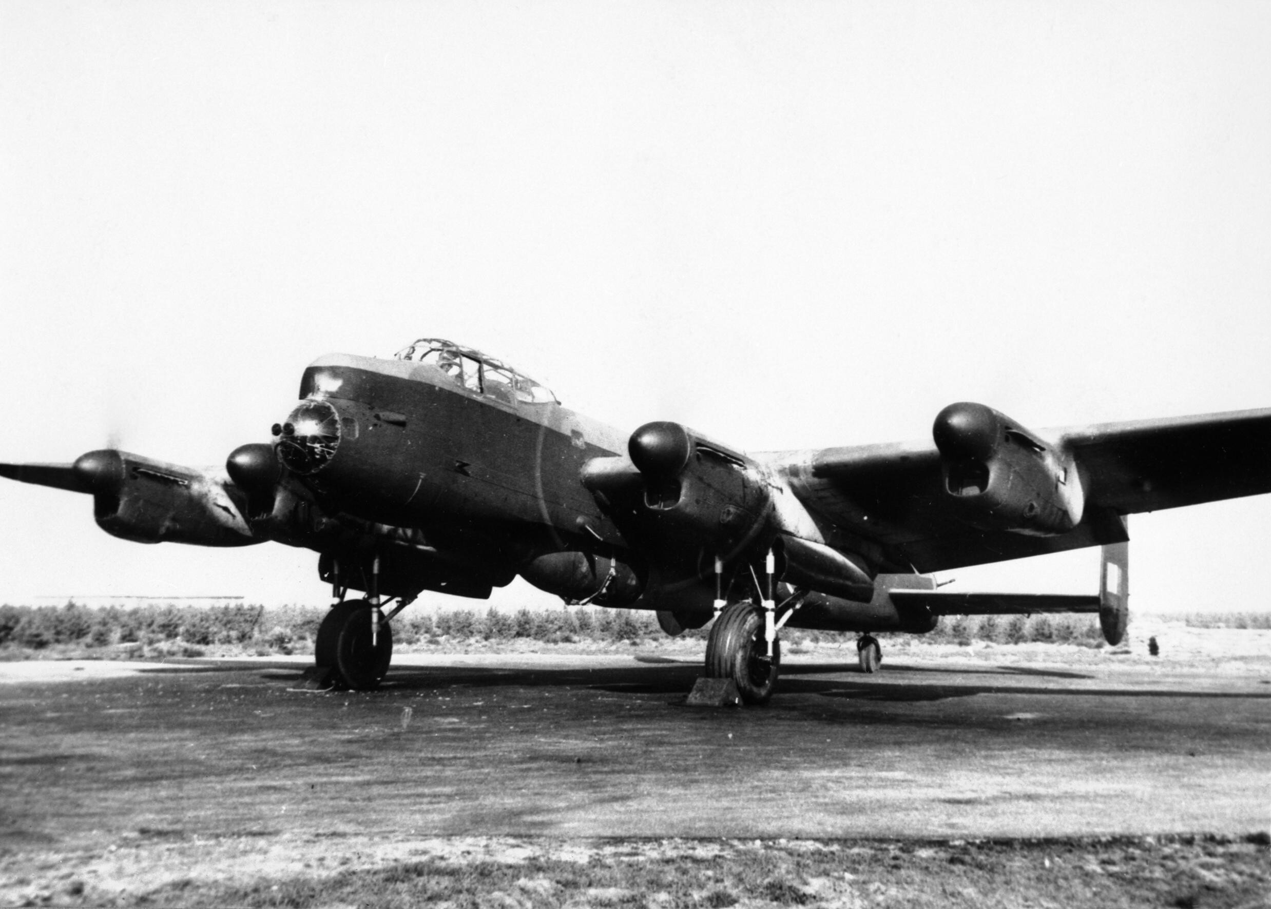 Avro Lancaster of 617 Squadron parked on a runway.