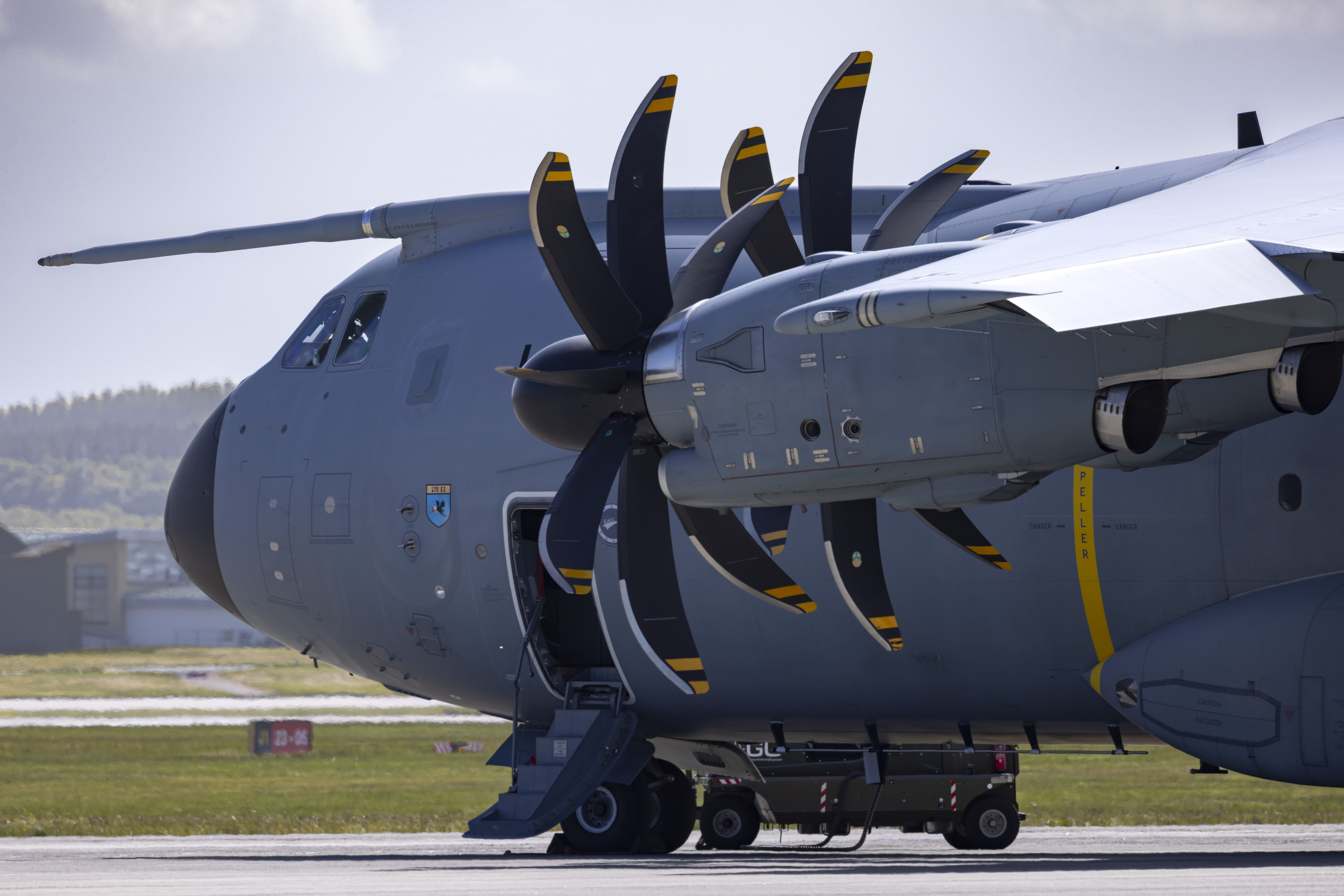 A Luftwaffe A400M parked on a runway.