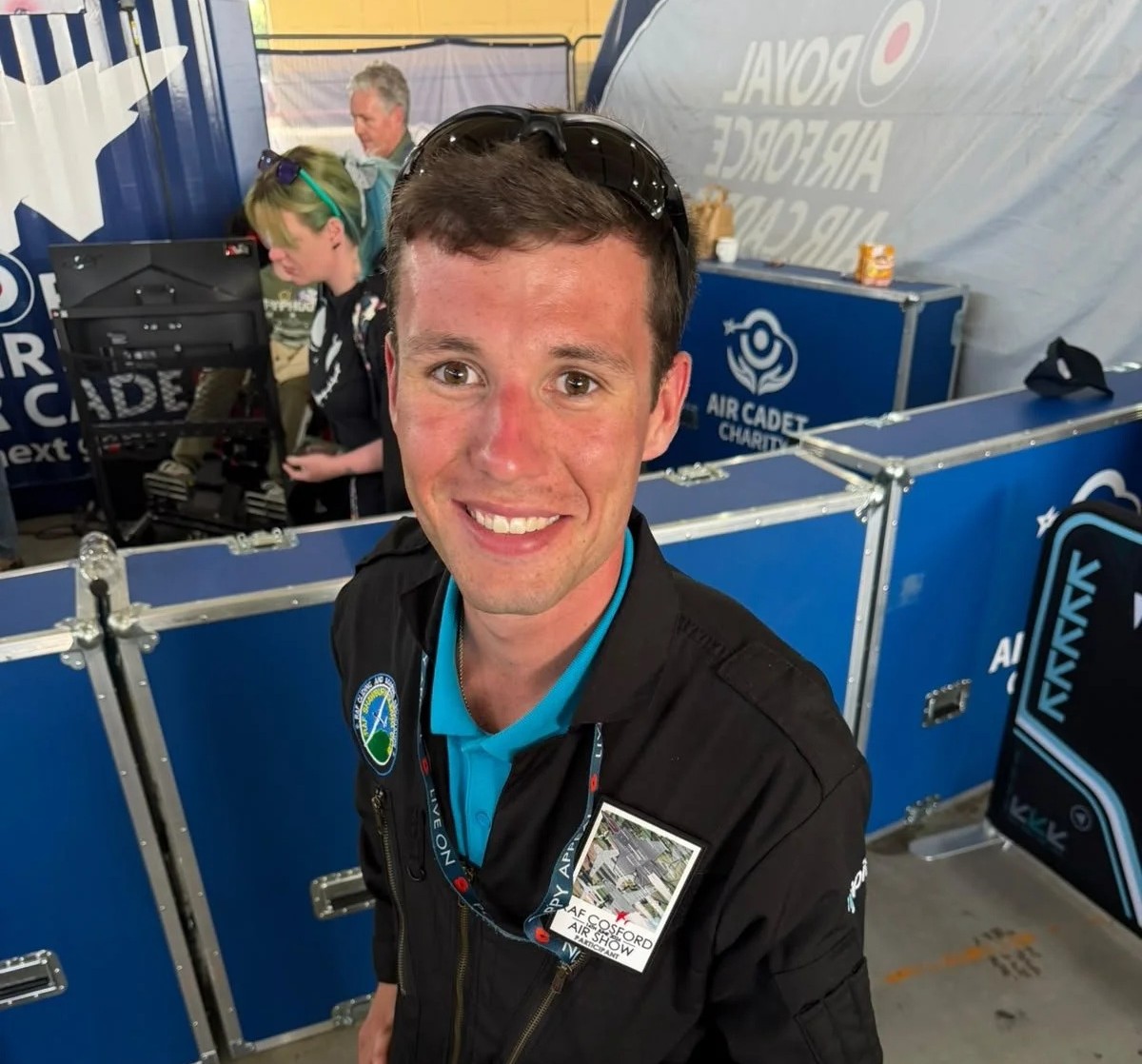 Air Recruit Bradley at RAF Cosford Air Show smiling at the camera.
