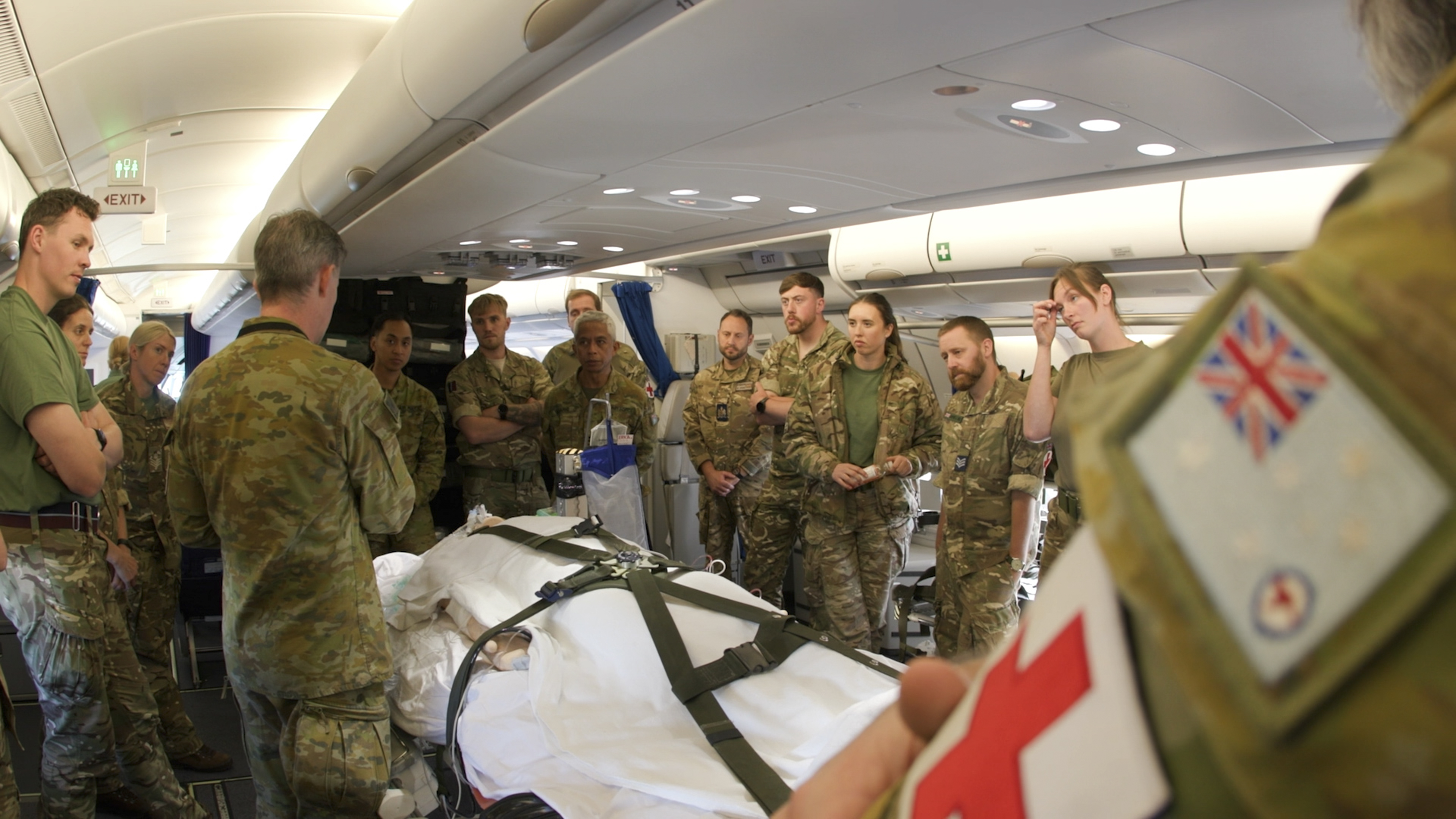 A group of Royal Air Force and Royal Australian Air Force medics training together on an aircraft.