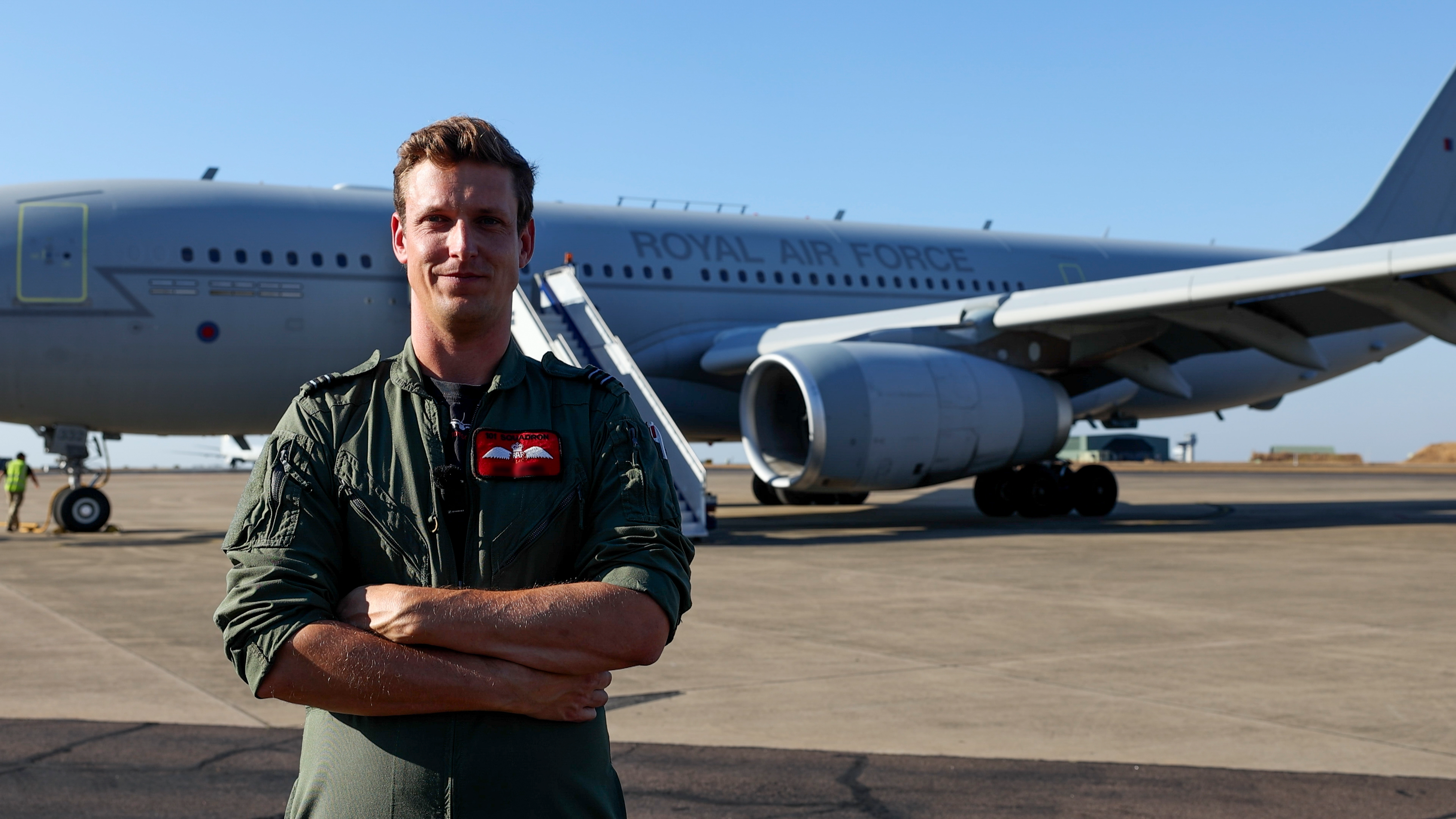 Voyager pilot Flight Lieutenant Sam stood in front of a Voyager aircraft at RAAF Darwin.