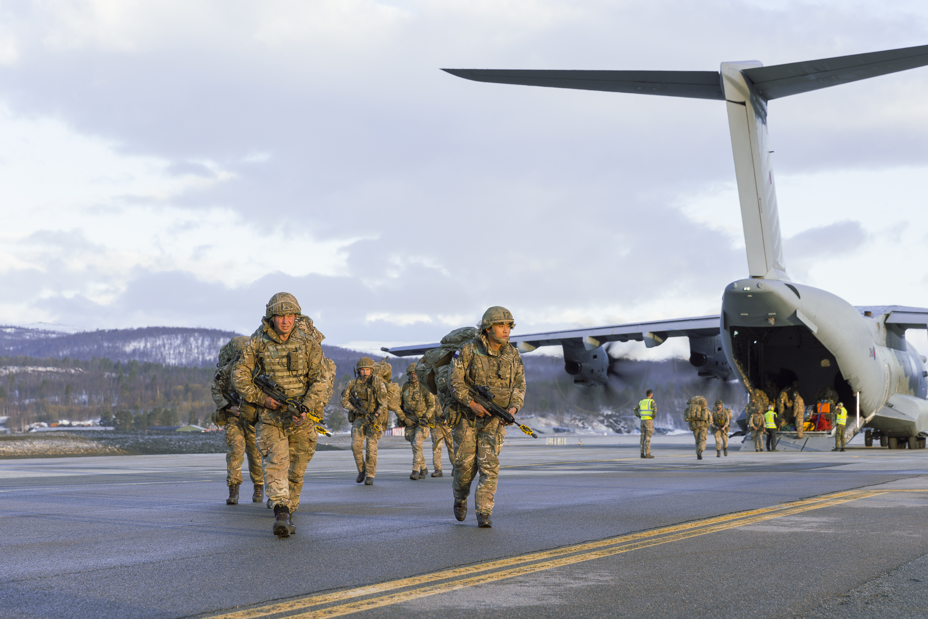 British military personnel disembarking from an RAF A400M.