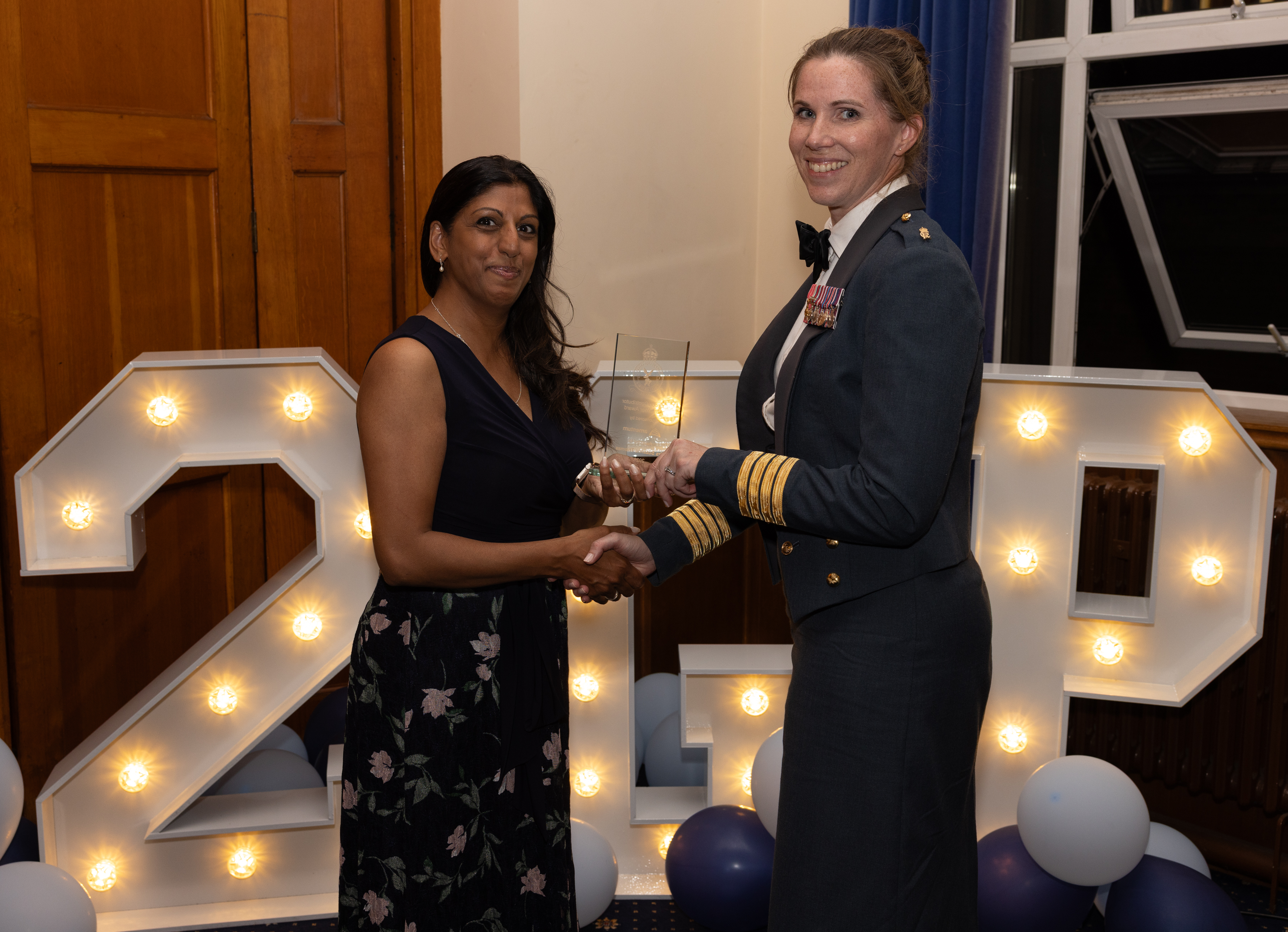 Presented by Sahaab Payne from Amentum to Stn Cdr RAF Brize Norton on behalf of Mrs Suzanne Thomas.