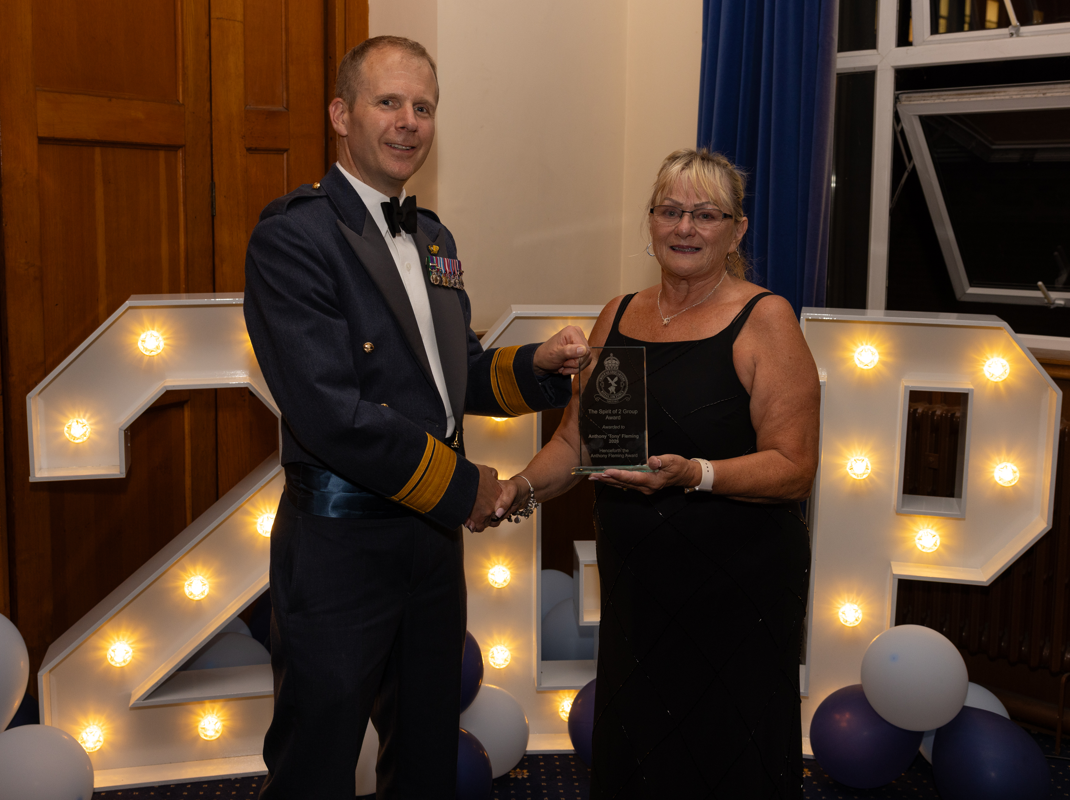 AVM Lyle presenting Mandy Fleming with The Anthony Fleming Spirit of No.2 Gp Award