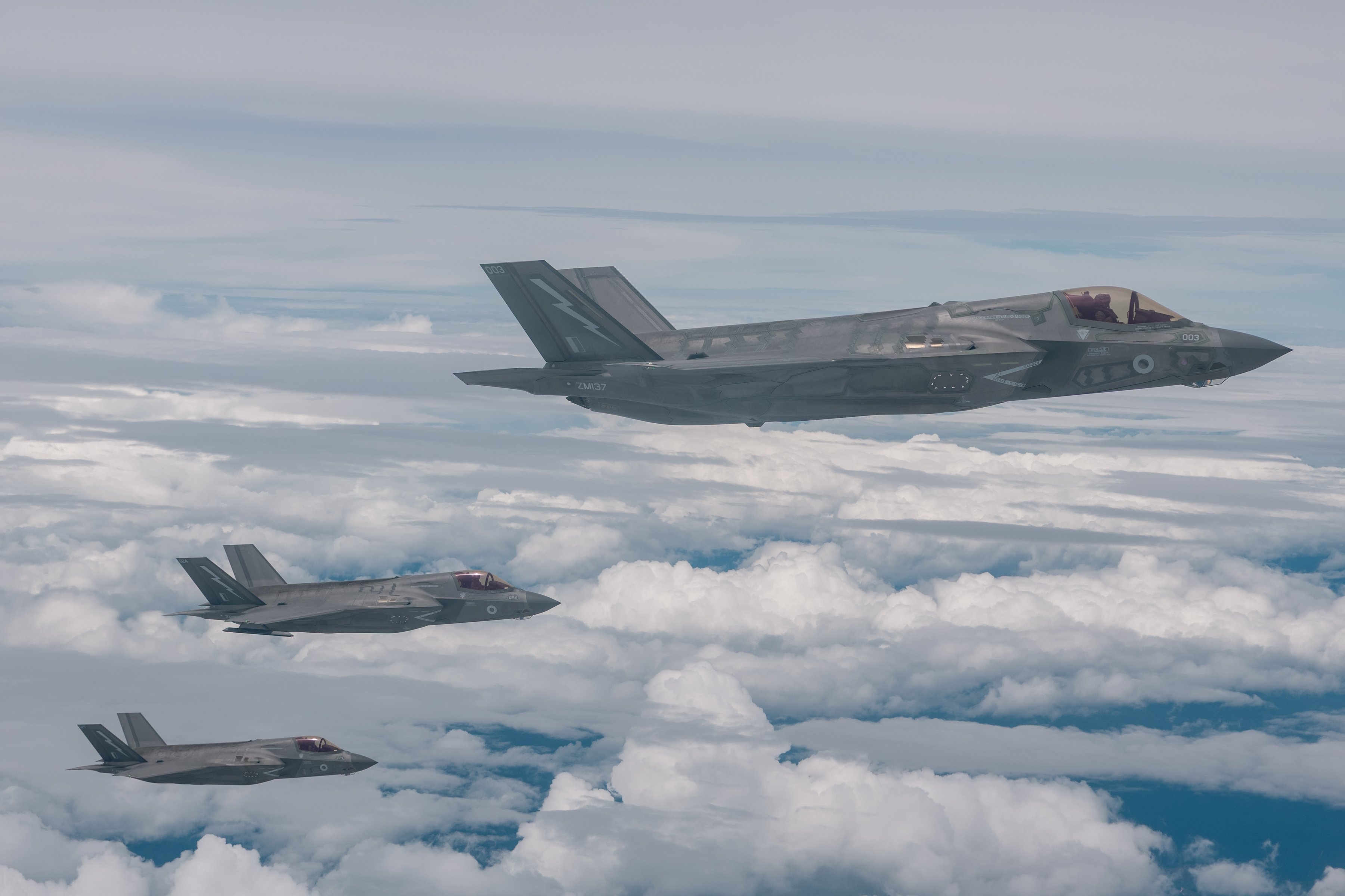 3 F-35 fly together