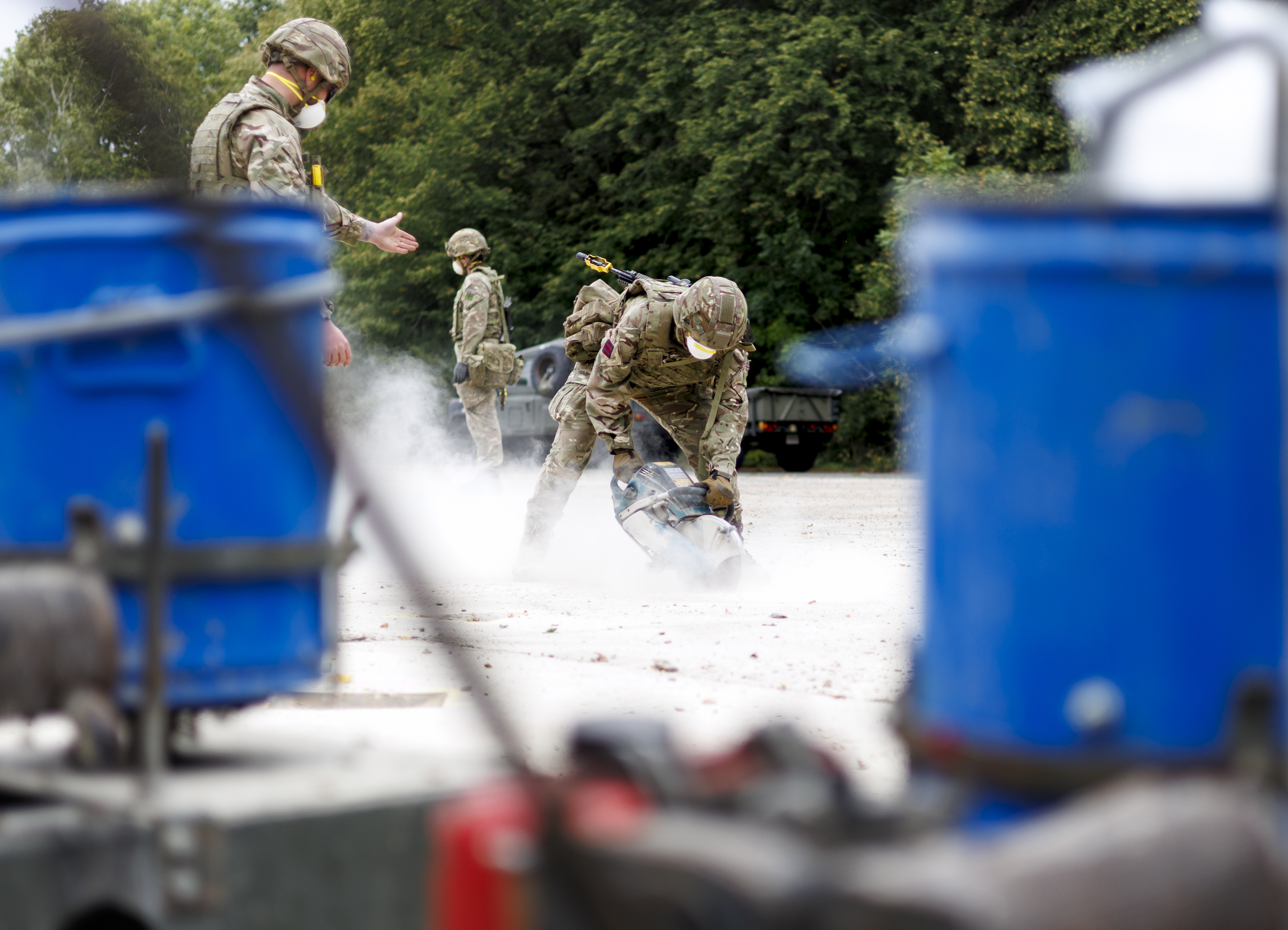 NATO and RAF Global Enablement personnel carrying out runway repairs.