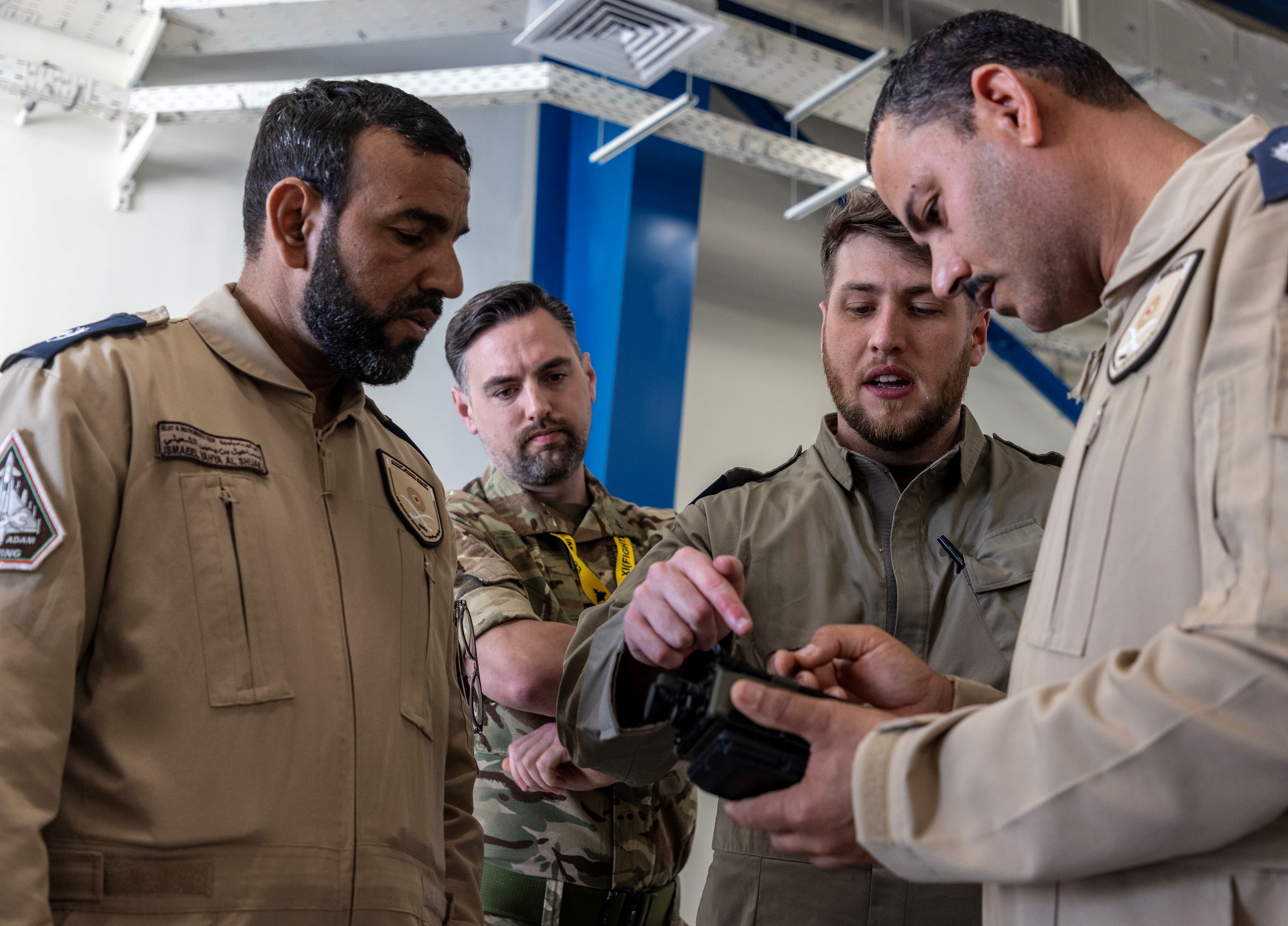 RAF serviceperson speaking to people from other nations