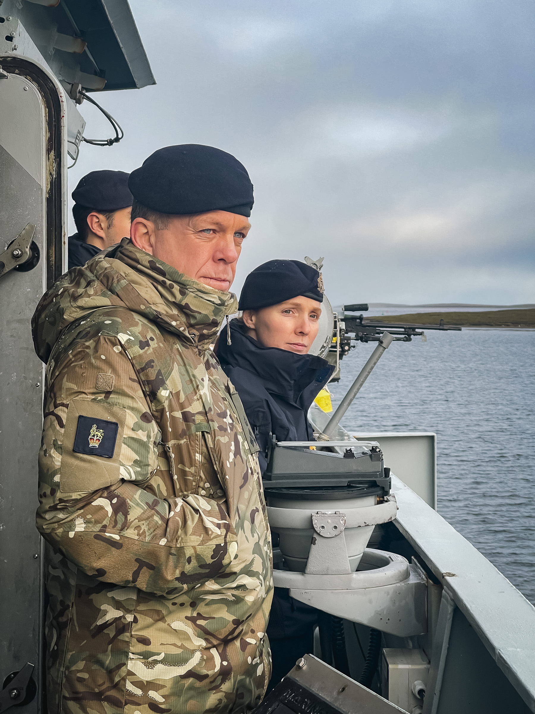 Picture of Brigadier Harmer and Ltr Cdr Murdoch looking from the bridge.