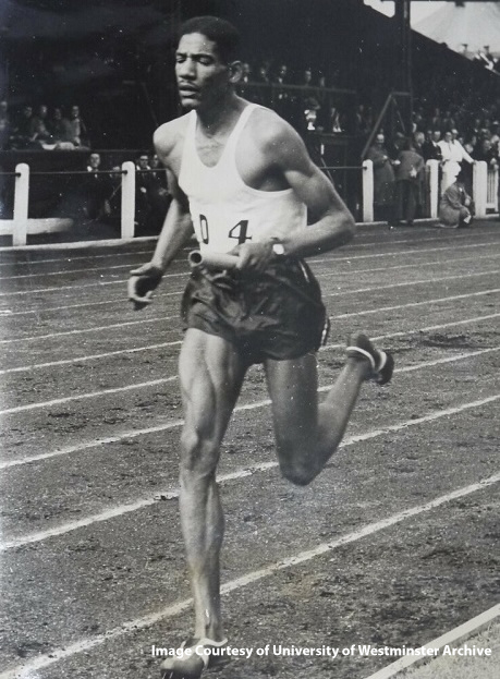 Black and white photo of runner on the track.