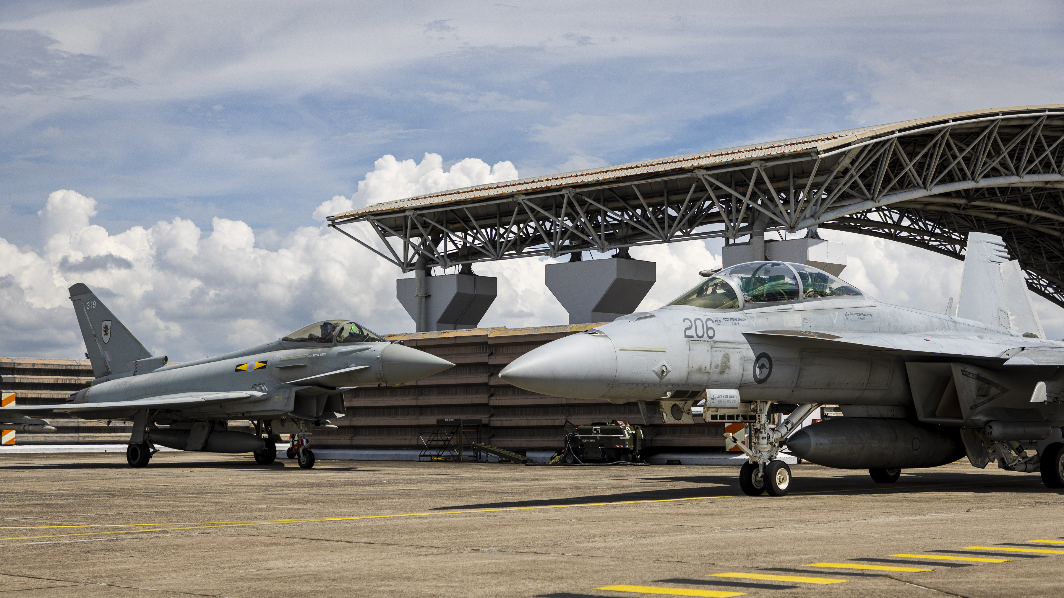 Military aircraft in a hangar