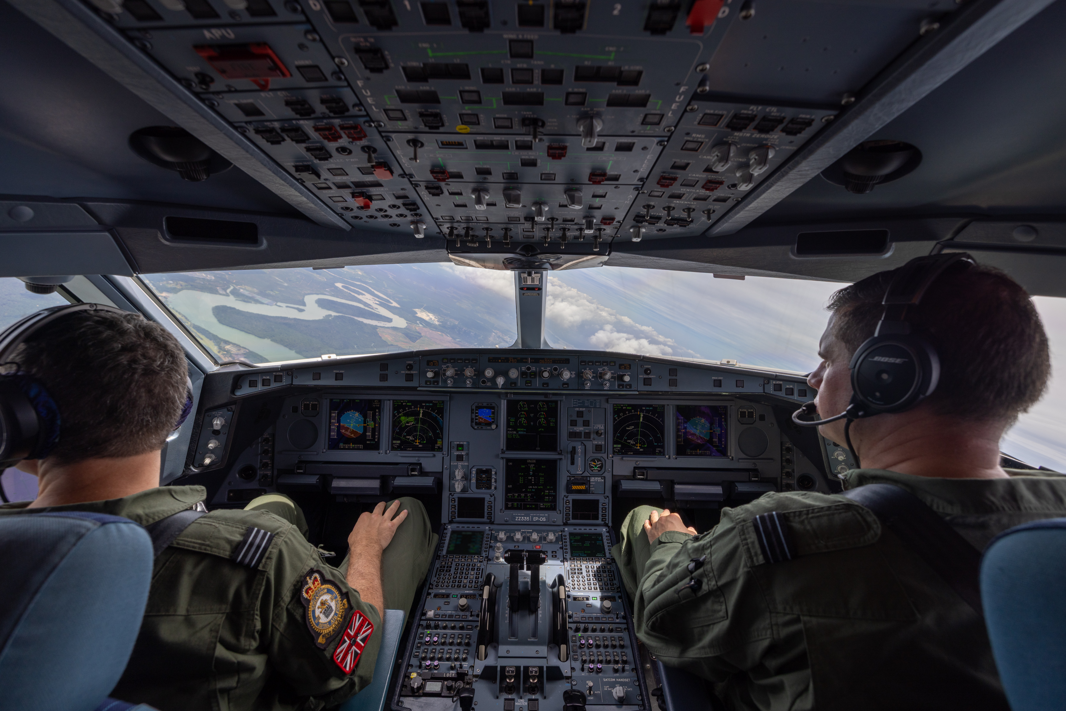 RAF Voyager pilots captured in the cockpit with Singapore ahead.