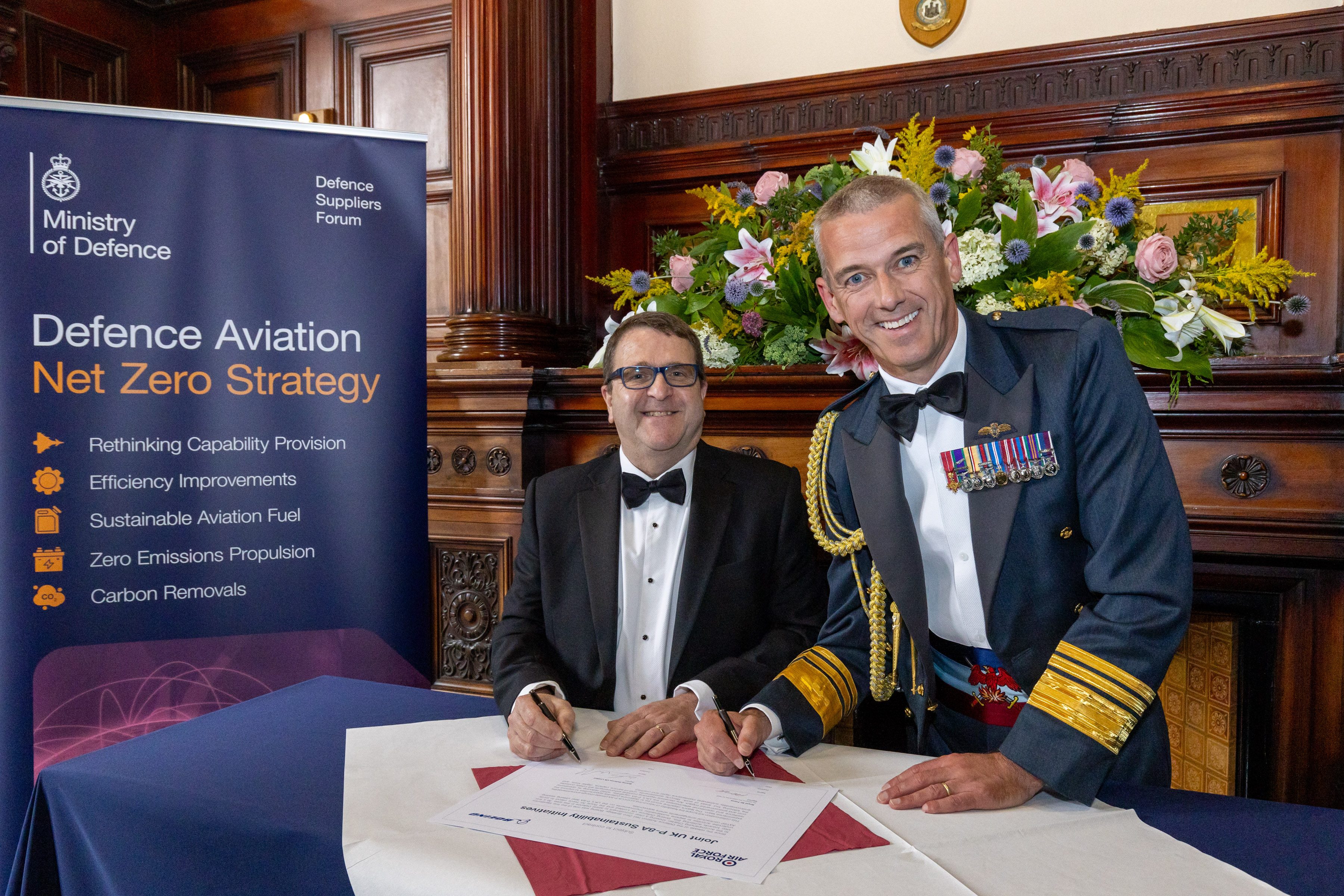 RAF and Boeing signing the document
