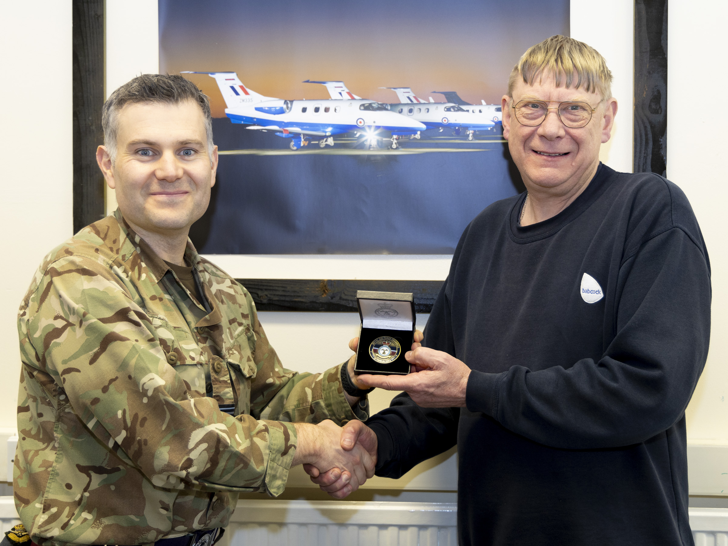 Mr Lord receiving the Station Cdrs Coin