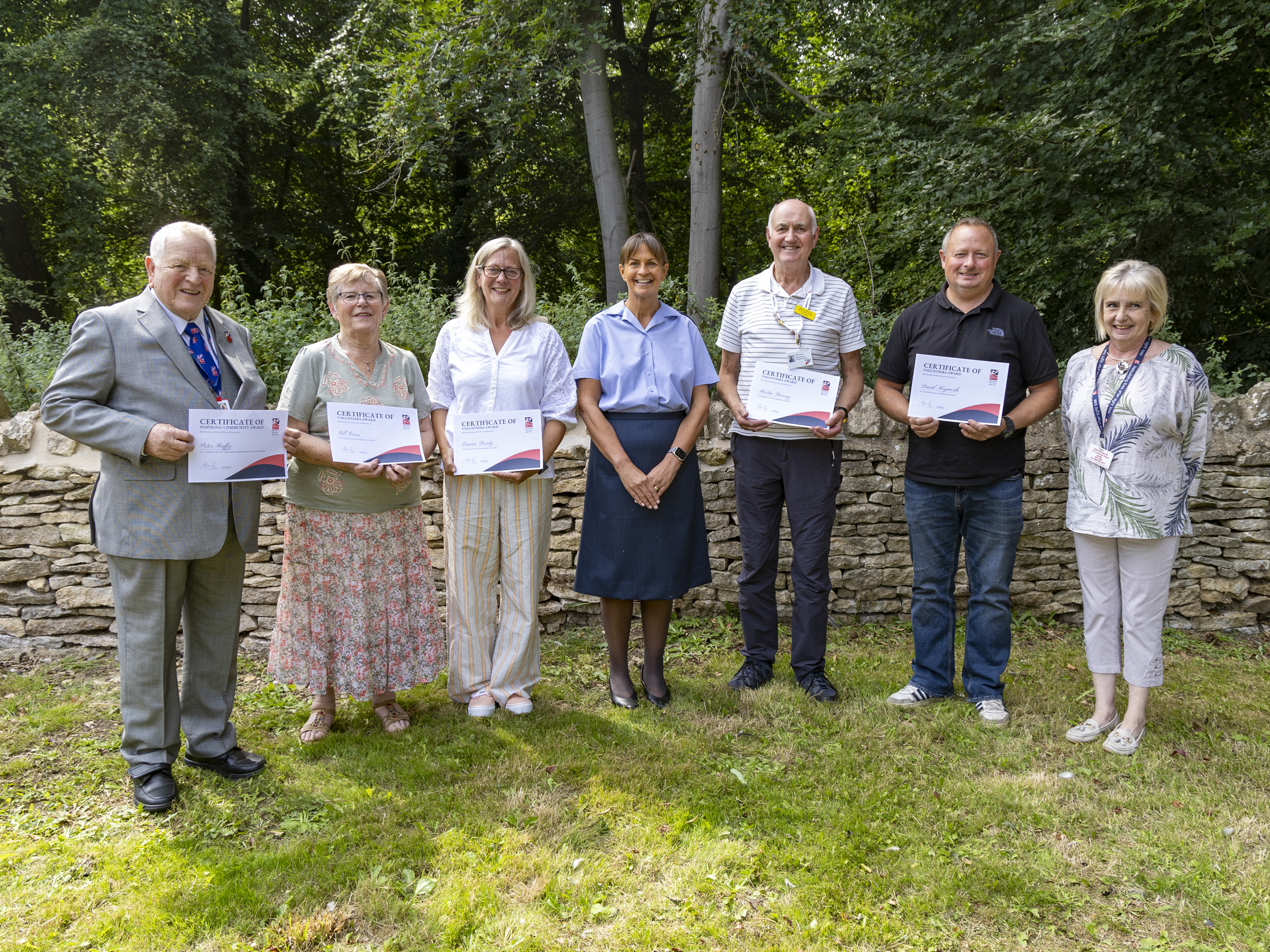 Recipients holding their Founders Awards cerificates