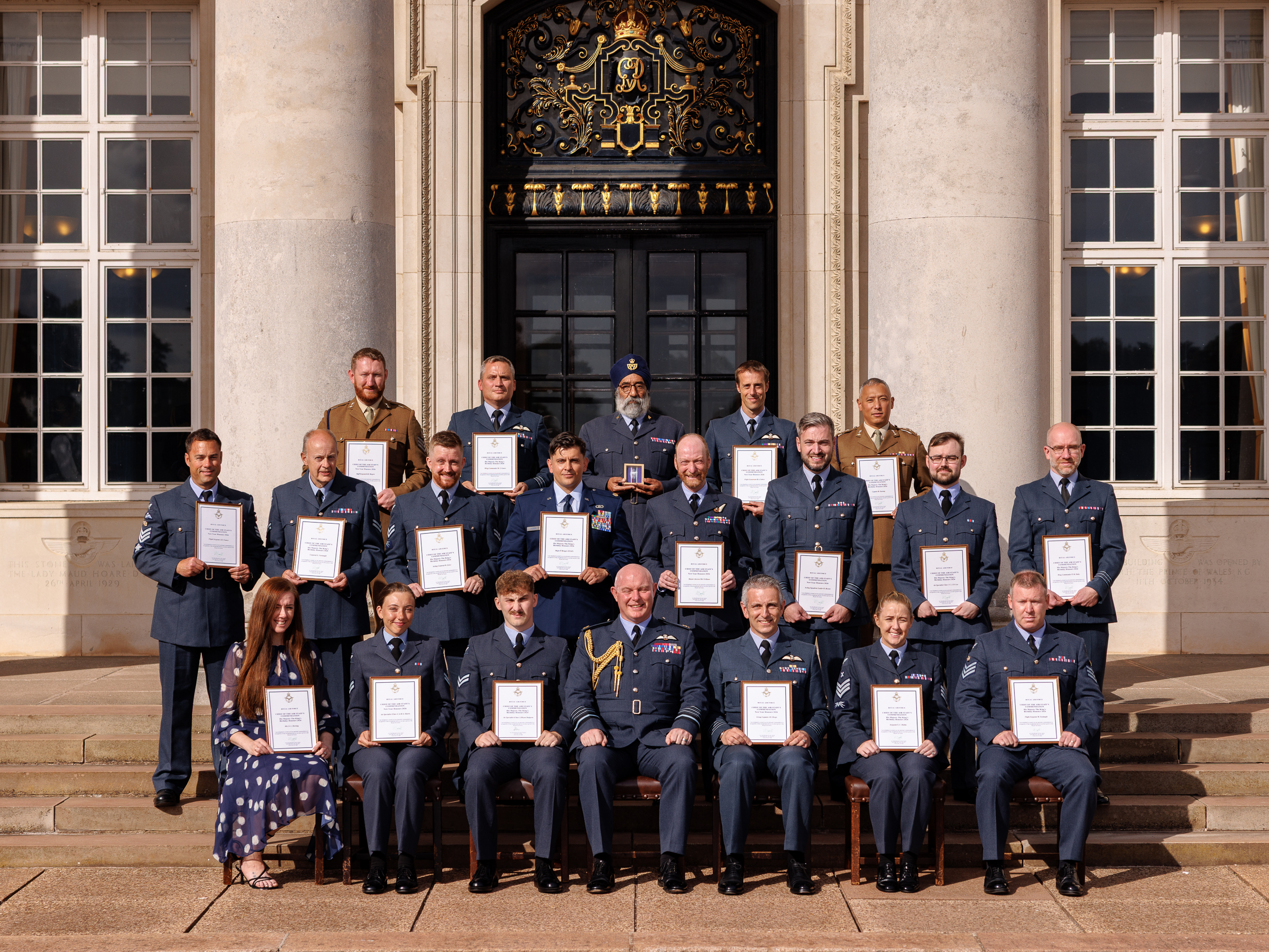 Award winners on the steps of CHOM