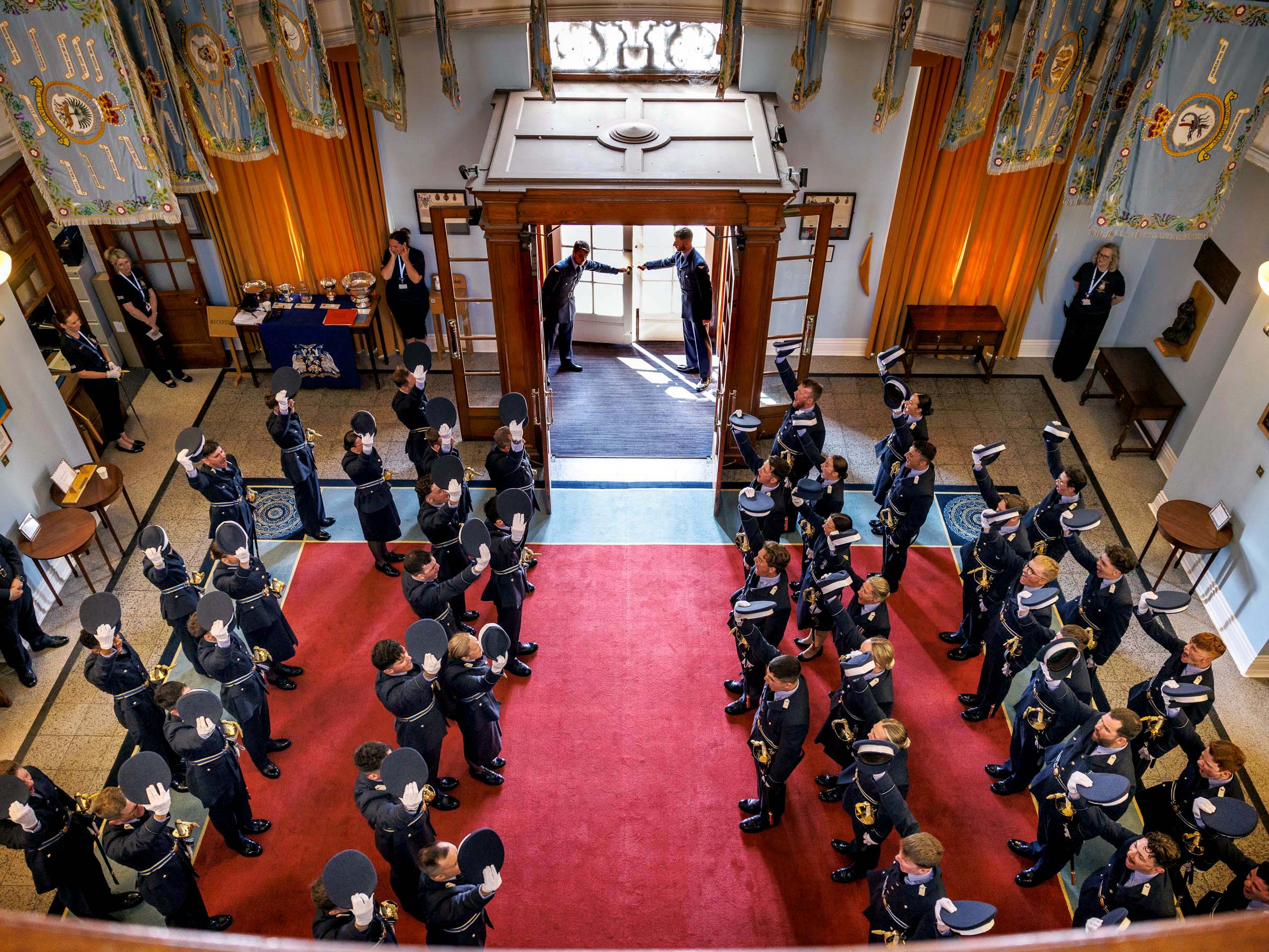 Hats raised in CHOM Rotunda