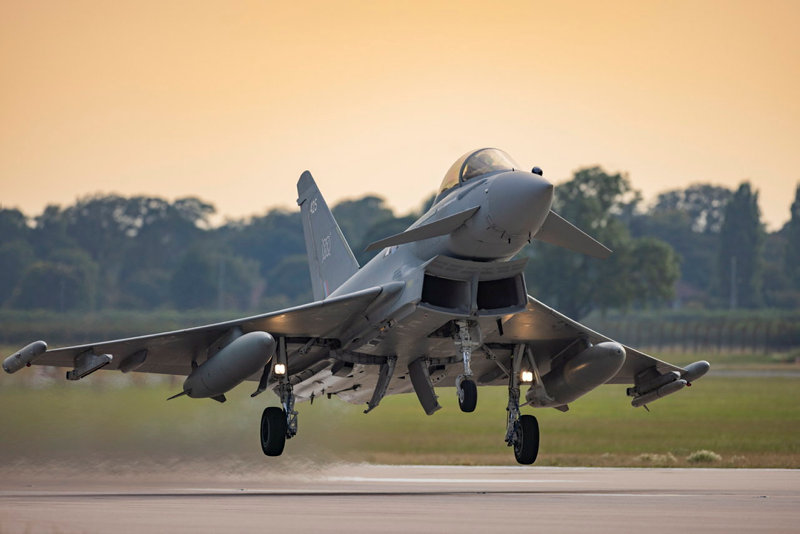 RAF Typhoon taking off at sunset