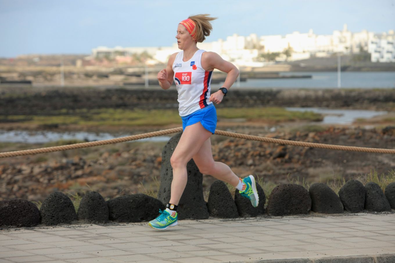 Wing Commander Wright during a triathlon in 2018.