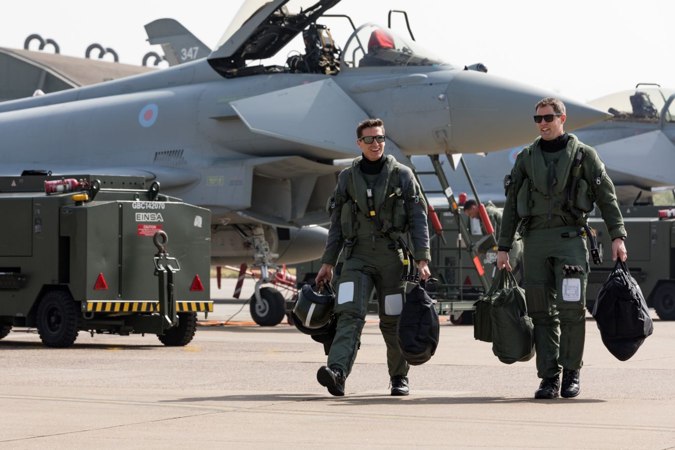 Typhoon pilots from XI Squadron walking to their aircraft.