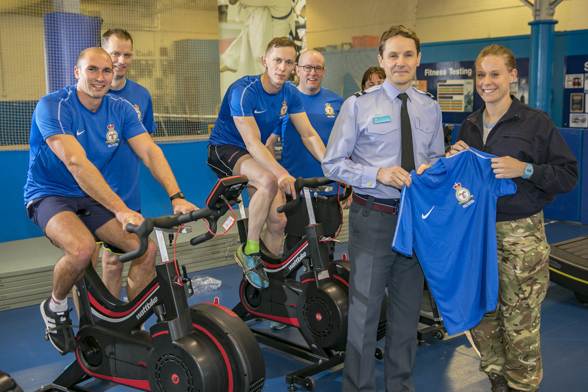 Air Commodore Peter J M Squires with participants from the fitness challenge